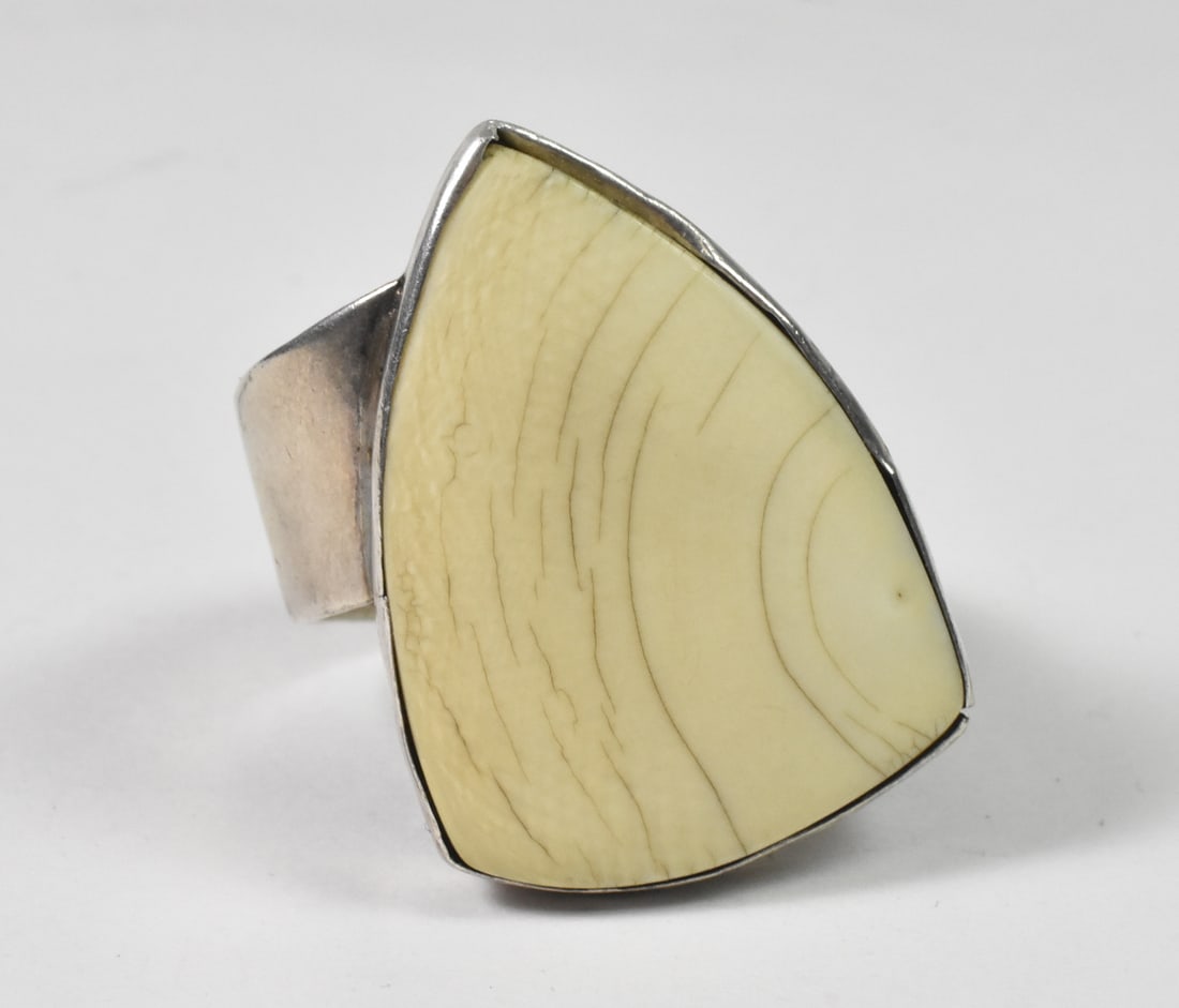Native American Sterling Ring, size 15+: This sterling Native American ring has a large triangular white stone, 1 3/8" x 1". This ring is size 15+ and is hallmarked DeFish. 25.3 grams