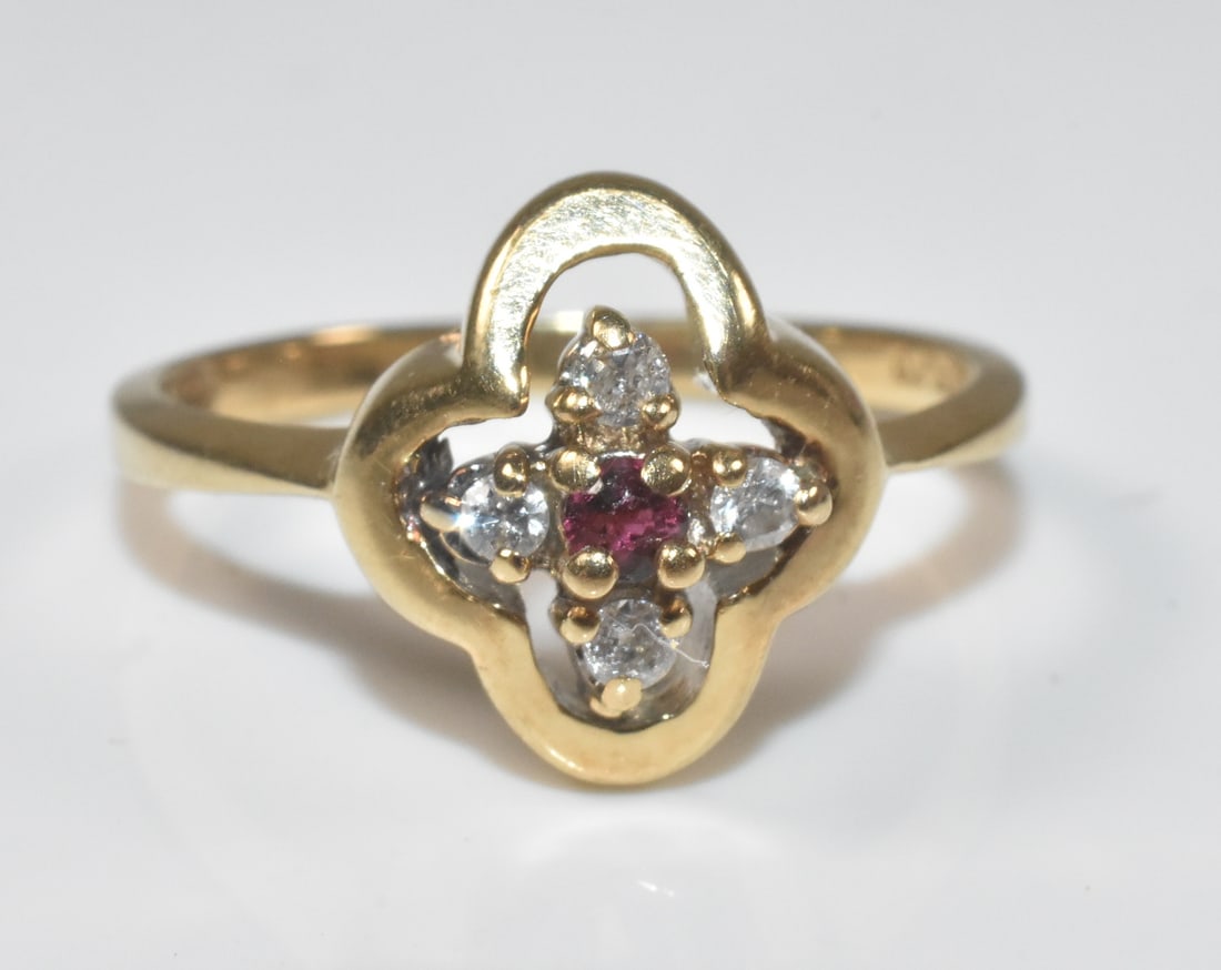 14k Yellow Gold Diamond Quatrefoil Ring: 14k yellow gold and diamond quatrefoil ring. Size 5 3/4". 3.1g.