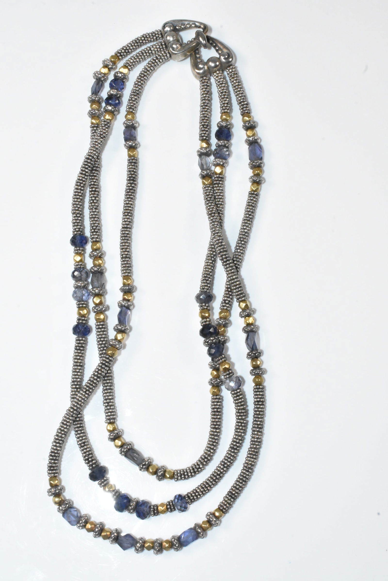Laura Gibson Sterling Beaded Caviar Necklace: 3-strand beaded cavier sterling necklace by Laura Gibson with purplish/blue and gold tone beads. 15". 99.7g.