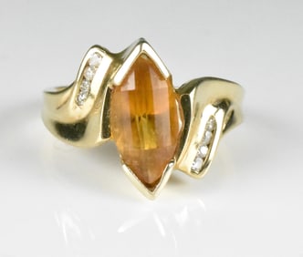 14k Yellow Gold Ring with Orange Colored Stone