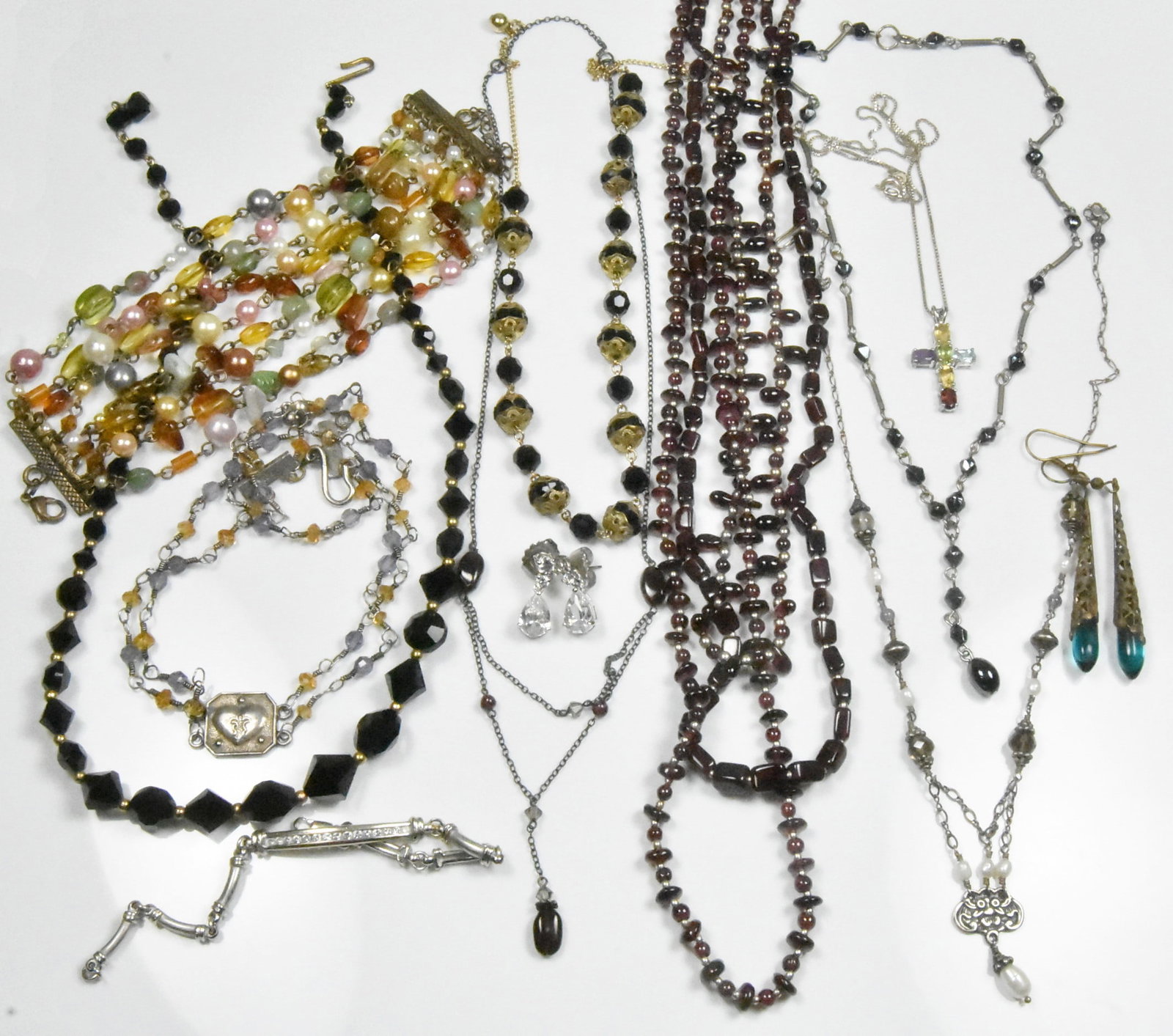 Victorian Style Beaded Jewelry Group: Group of 12 pieces Victorian style jewelry includes multi colored bracelet 6", adjustable to 8", silver link bracelet 6 1/2", blue drop earrings 2", rhinestone earrings, 2 strand choker, y drop