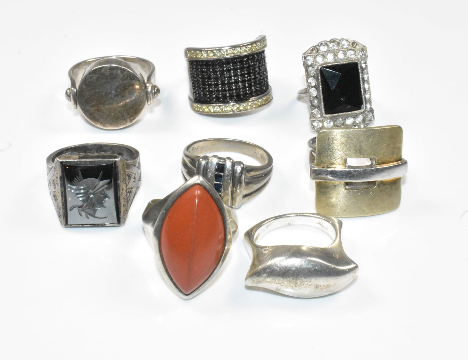 Sterling Rings Group: Group of 8 chunky sterling rings, size range 4 - 8 1/2. 81.1g.