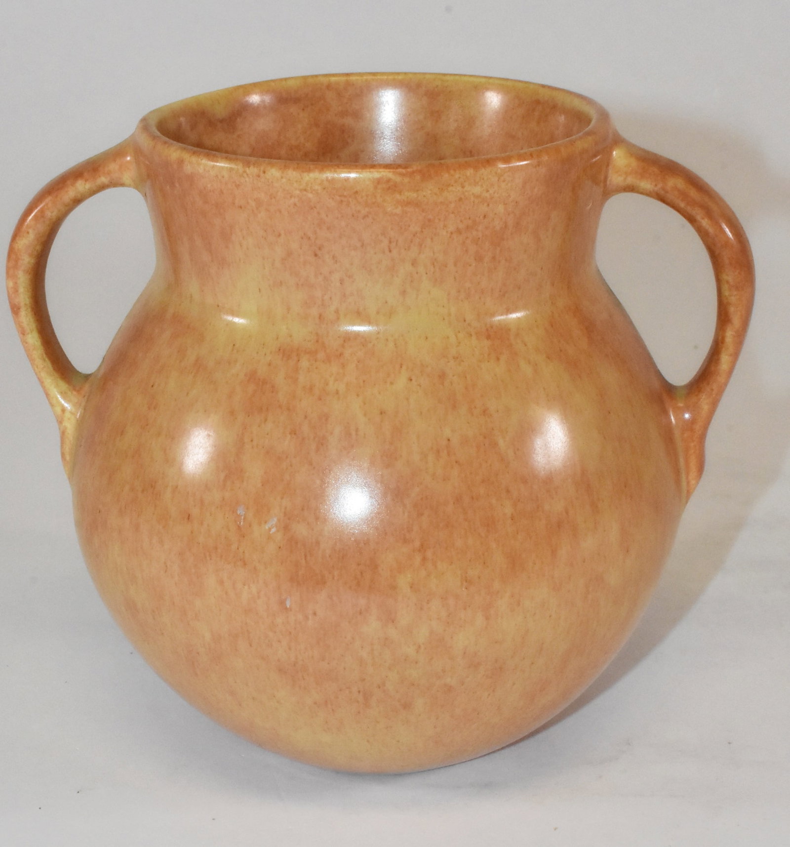 Roseville Tourmaline Double Handle Vase 1930's: Roseville Tourmaline double handle vase in red over tan, 1930's. 6" tall. Excellent condition.