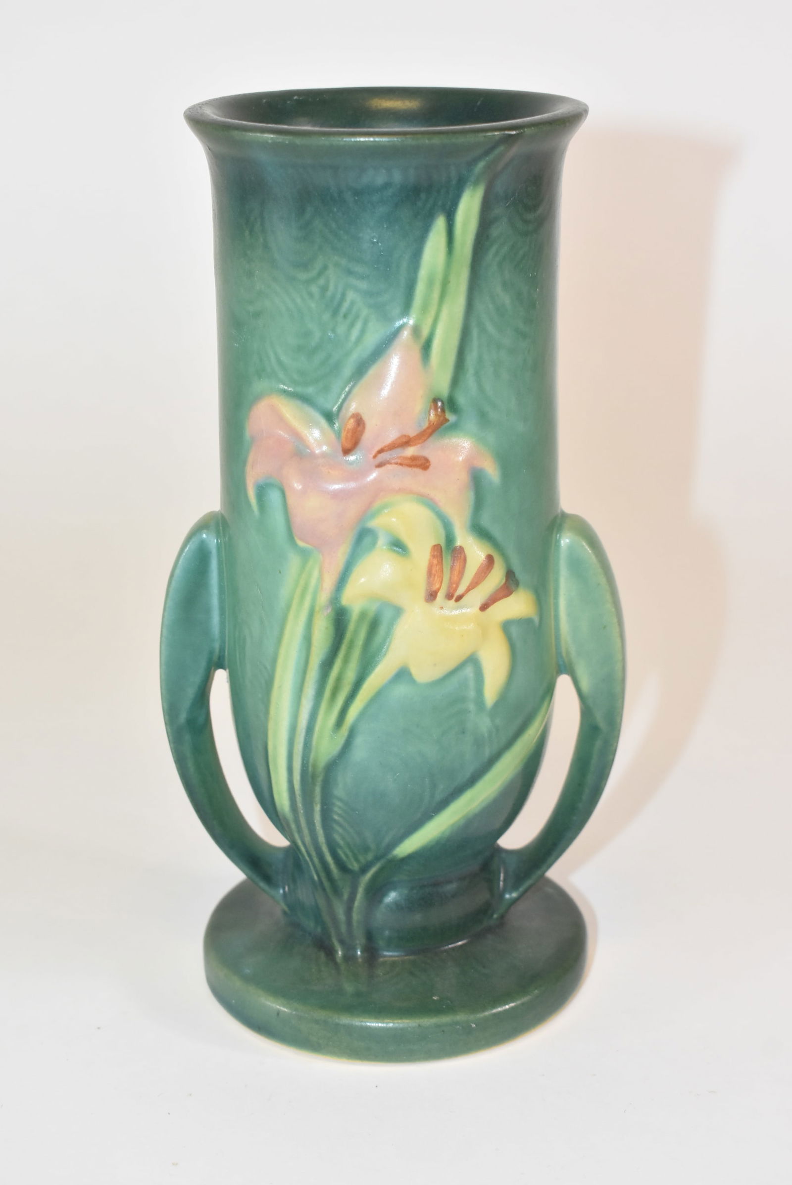 Roseville Zephyr Lily in Bermuda Blue 133-8: Roseville Zephyr Lily in Bermuda Blue #133-8, 8" tall. Light crazing