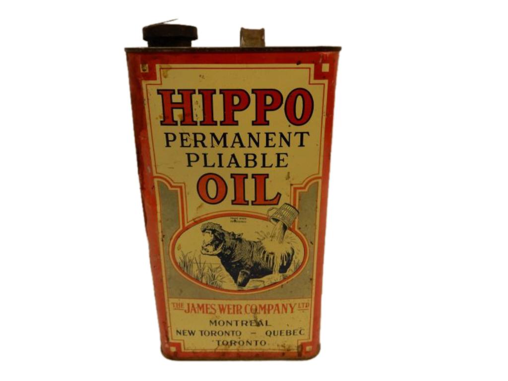 HIPPO PERMANENT PLIABLE OIL IMP. GAL. CAN: JAMES WEIR COMPANY LTD, MONTREAL, NEW TORONTO, QUEBEC, TORONTO, CORRECT CAP & SOLDERED HANDLE, BILINGUAL, LEFT SIDE OF CAN SHOWS RUST DAMAGE, SOME STAINING & SOME RUST ON OTHER SIDE, EXCELLENT GRAPHIC