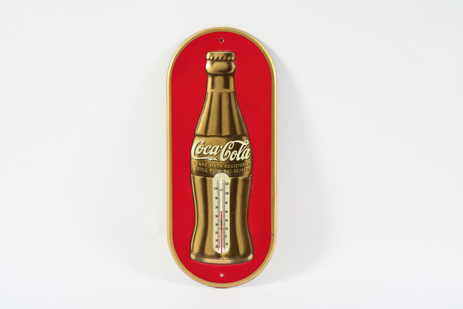 1937 COCA-COLA ANNIVERSARY BOTTLE TIN THERMOMETER: 1937 COCA-COLA "ANNIVERSARY BOTTLE" EMBOSSED TIN THERMOMETER MARKED MADE IN U.S.A. WFR 7-1-37 STRONG COLOURS AND GLOSS FIELD IN NEAR MINT CONDITION SHOWS SOME LIGHT SURFACE SCRATCHES WITH WORKING TUBE