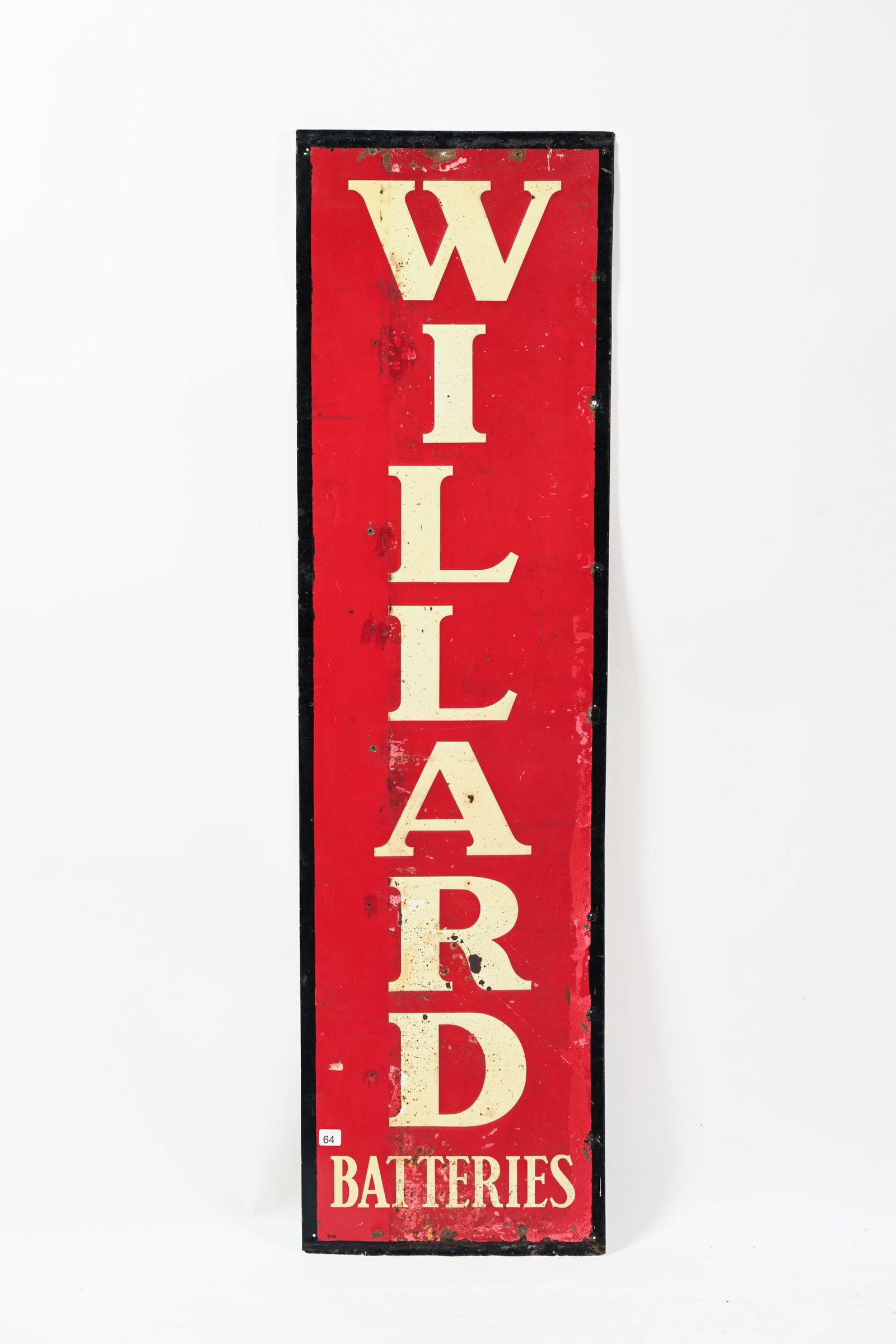 WILLARD BATTERIES EMBOSSED TIN VERTICAL SIGN: WILLARD BATTERIES EMBOSSED TIN VERTICAL SIGN MARKED CCC 54 FIELD SHOWS EXTENSIVE WEAR AND PAINT LOSS BLACK BORDER HAS BEEN REPAINTED EXTRA HOLES ADDED 14"X51" *ALL ITEMS GUARANTEED AUTHENTIC BY