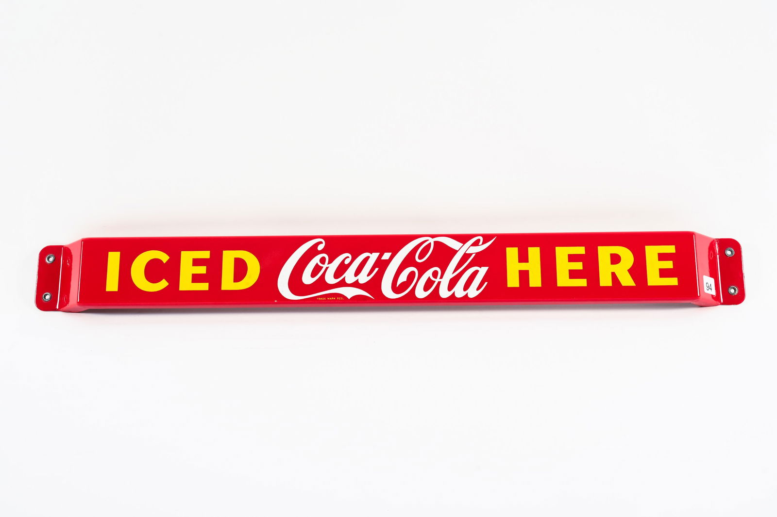 1958 ICED COCA-COLA HERE PORCELAIN PUSH BAR: 1958 ICED COCA-COLA HERE PORCELAIN PUSH BAR MARKED MADE IN CANADA P&M STRONG COLOURS AND GLOSS FIELD IN NEAR MINT CONDITION SHOWS SOME LIGHT SURFACE SCRATCHES SMALL SECTION OF PORCELAIN LOSS WITH