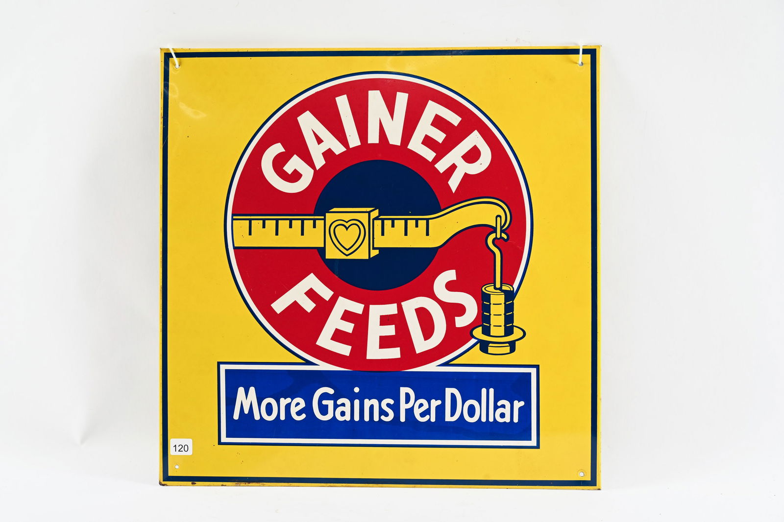 GAINER FEEDS "MORE GRAINS PER DOLLAR" TIN SIGN: GAINER FEEDS "MORE GRAINS PER DOLLAR" TIN SIGN NOT MARKED STRONG COLOURS AND GLOSS FIELD IN NEAR MINT CONDITION SLIGHT RICE PAPER RESIDUE MOUNTING HOLES ADDED AT CORNERS 20"X20" *ALL ITEMS