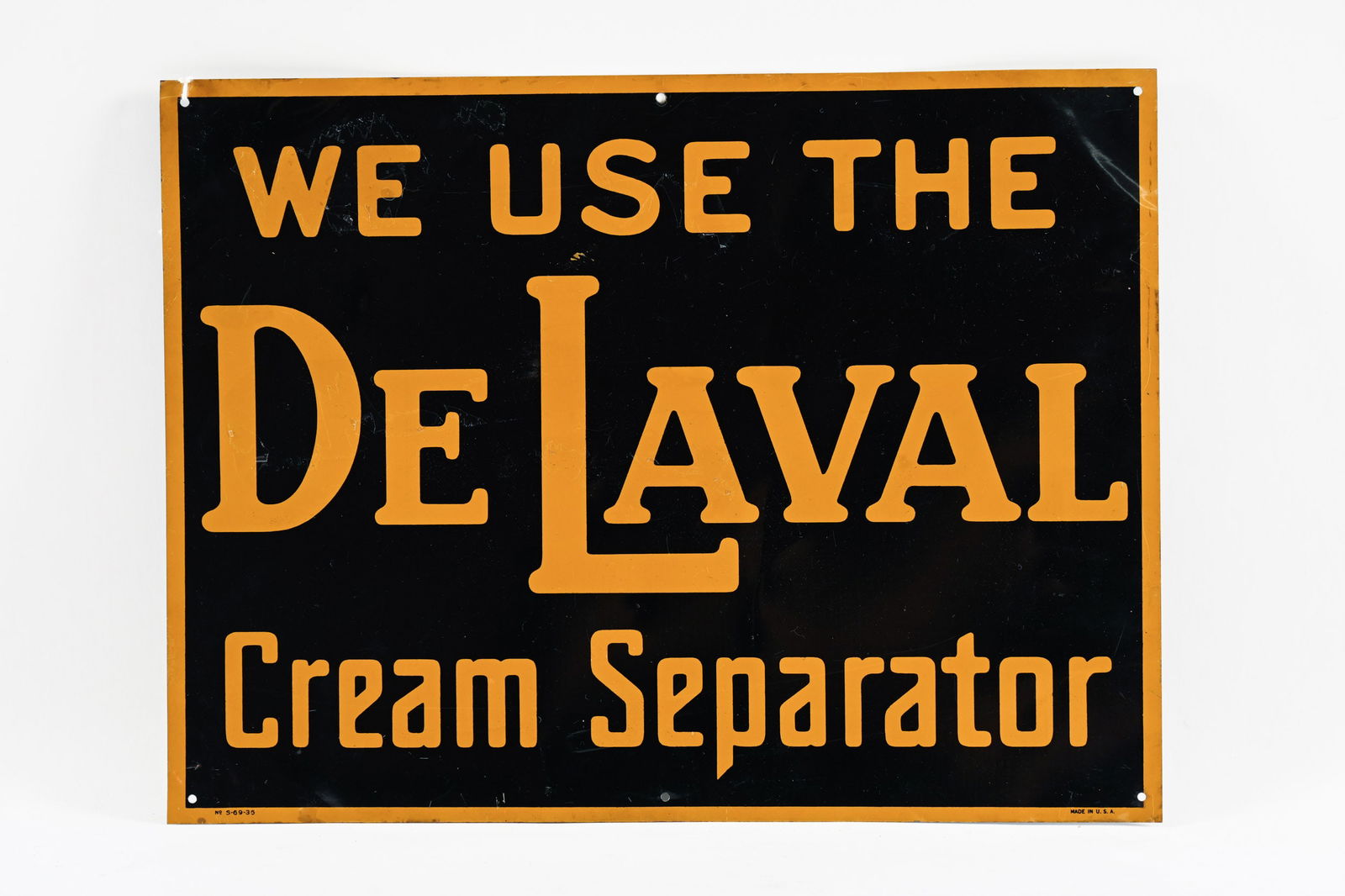 WE USE DE LAVAL CREAM SEPARATOR TIN SIGN: WE USE DE LAVAL CREAM SEPARATOR TIN SIGN MARKED MADE IN U.S.A. GOOD CONDITION WITH STRONG COLOURS SHOWS SOME SURFACE WEAR AND SLIGHT CREASES 16"X12" *ALL ITEMS GUARANTEED AUTHENTIC BY SHACKELTON