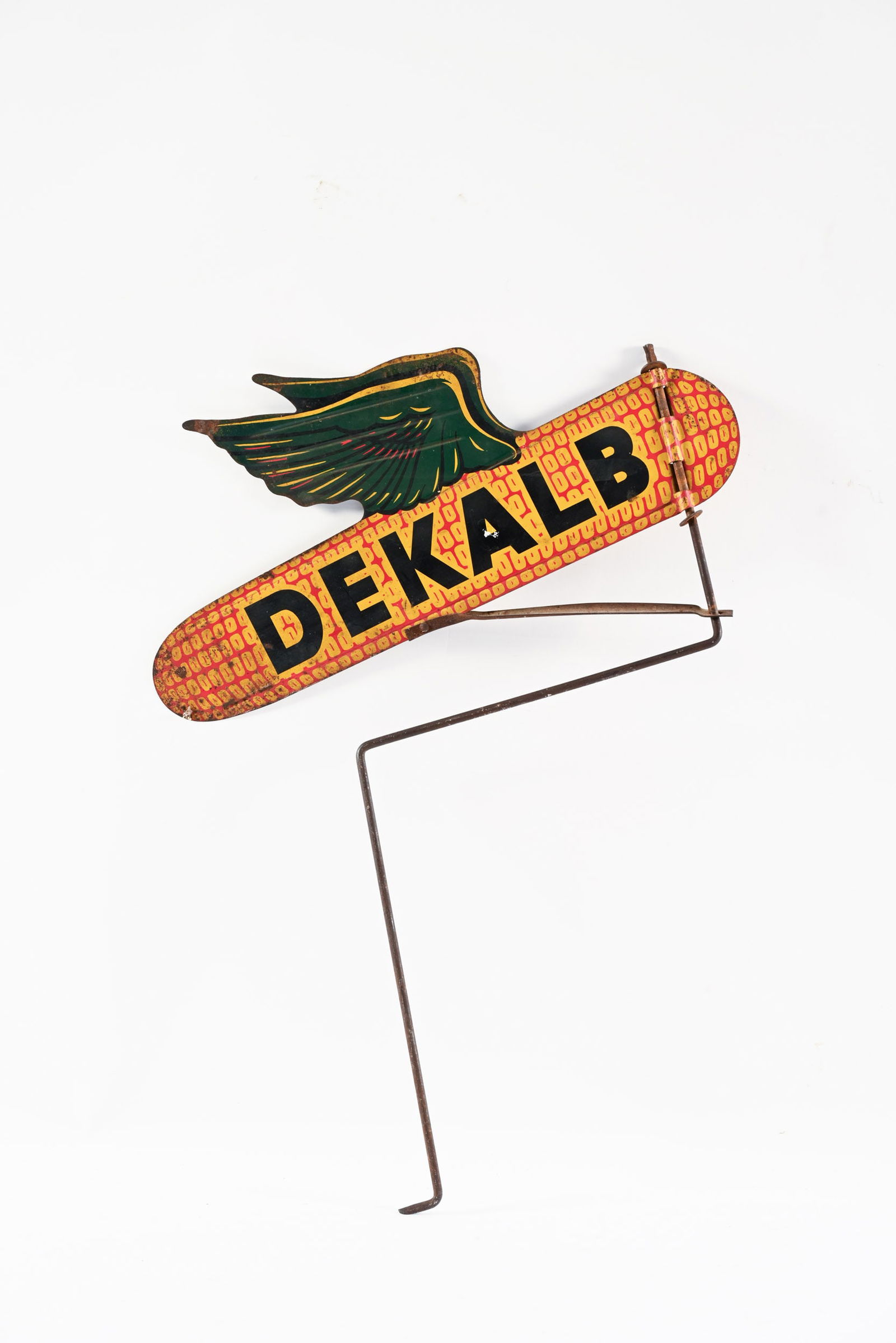 DEKALB DOUBLE SIDED TIN WEATHERVANE: DEKALB DOUBLE SIDED TIN WEATHERVANE NOT MARKED SHOWS WEAR AND OXIDATION ON BOTH SIDES 18"X9" *ALL ITEMS GUARANTEED AUTHENTIC BY SHACKELTON AUCTIONS UNLESS OTHERWISE SPECIFIED