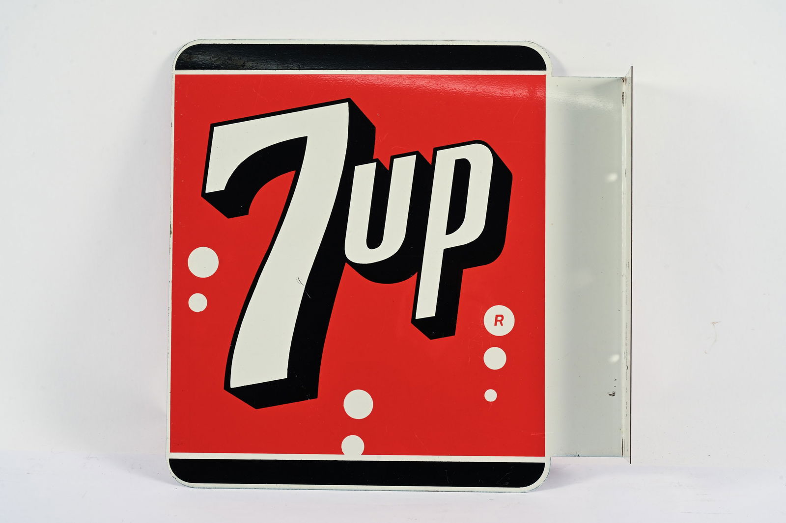 1965 7UP DOUBLE SIDED TIN FLANGE SIGN: 1965 7UP DOUBLE SIDED TIN FLANGE SIGN MARKED STOUT SIGN CO. ST. LOUIS, MO, MADE IN U.S.A. STRONG COLOURS AND GLOSS FIELD IN NEAR MINT CONDITION WITH MINOR SURFACE SCRATCHES ON BOTH SIDES 16"X16" 
