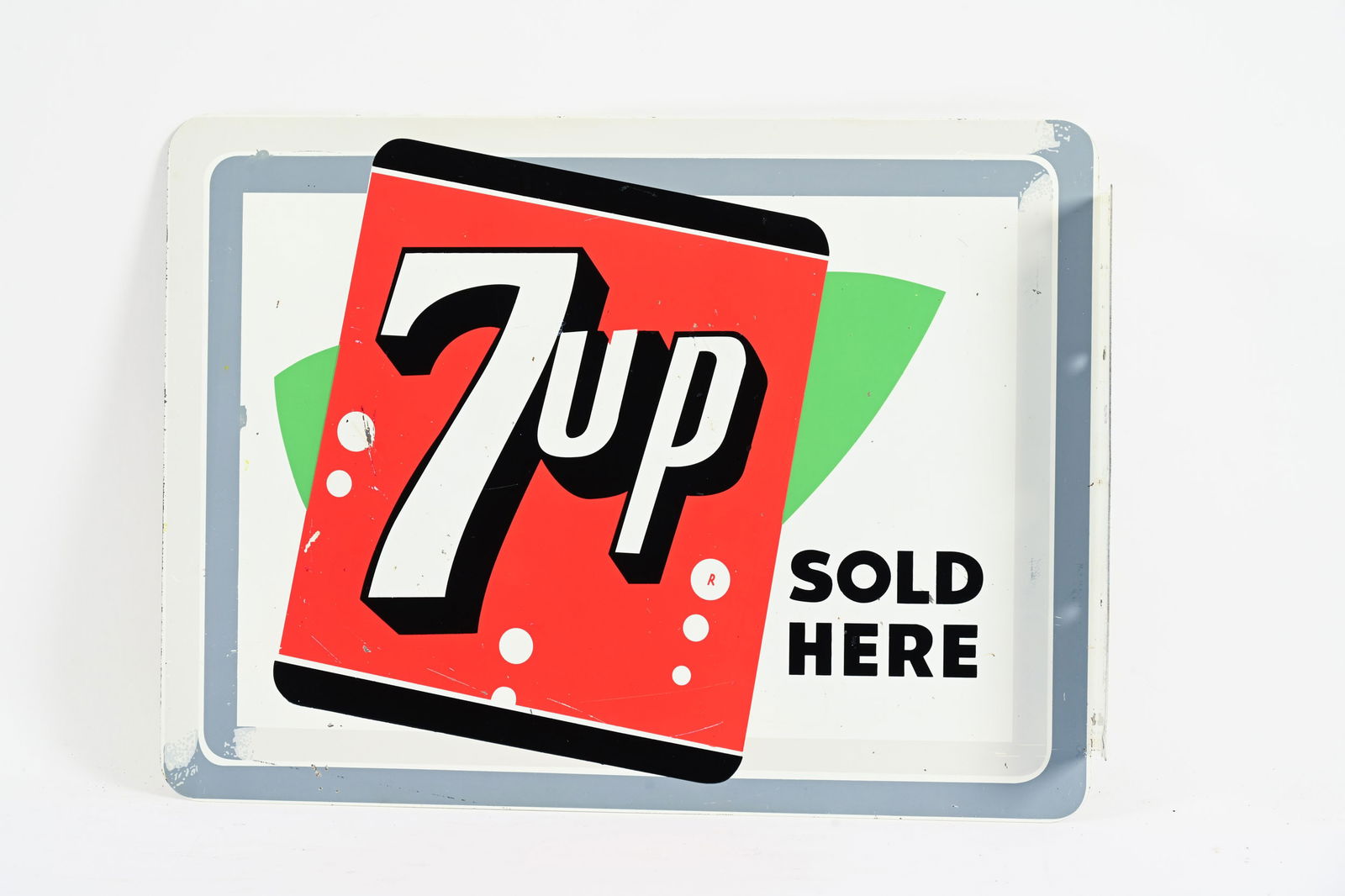 1956 7UP SOLD HERE DOUBLE SIDED TIN FLANGE SIGN: 1956 7UP SOLD HERE DOUBLE SIDED TIN FLANGE SIGN MARKED STOUT SIGN CO. ST. LOUIS, MO, 7-56 MADE IN U.S.A. NO.12 GOOD COLOURS AND GLOSS SHOWS SOME SURFACE SCRATCHES WITH PAINT LOSS ON FRONT SIDE BACK SI