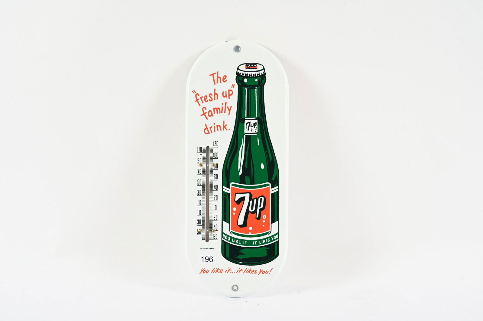 7UP THE "FRESH UP" FAMILY DRINK PORC. THERMOMETER: 7UP THE "FRESH UP" FAMILY DRINK PORCELAIN THERMOMETER MARKED P&M NEAR MINT CONDITION MINOR AREA OF PORCELAIN LOSS AT UPPER EDGE WITH WORKING TUBE 6"X15" *ALL ITEMS GUARANTEED AUTHENTIC BY