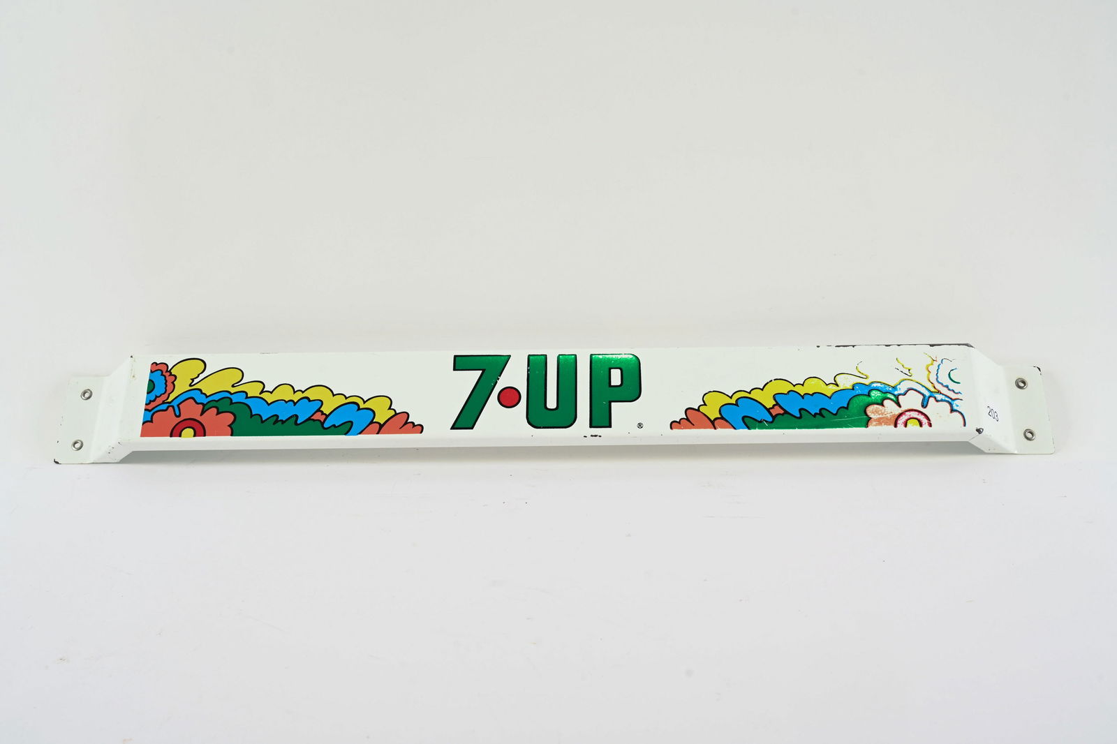 1970'S 7UP PETER MAX STYLE PAINTED METAL PUSH BAR: 1970'S 7UP PETER MAX STYLE PAINTED METAL PUSH BAR NOT MARKED FIELD SHOWS SOME WEAR WITH PAINT LOSS MOST EVIDENT AT RIGHT SIDE 31"X3" *ALL ITEMS GUARANTEED AUTHENTIC BY SHACKELTON AUCTIONS UNLESS
