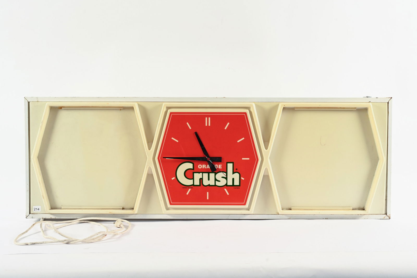 ORANGE CRUSH LIGHTED MENU BOARD CLOCK: ORANGE CRUSH LIGHTED MENU BOARD CLOCK NOT MARKED VACUFORMED PLASTIC FRONT WITH METAL CAN PLASTIC FRONT SHOWS SOME DISCOLOURATION NO CRACKS OR CHIPS WORKING CLOCK AND LIGHTS 48"X16" *ALL ITEMS