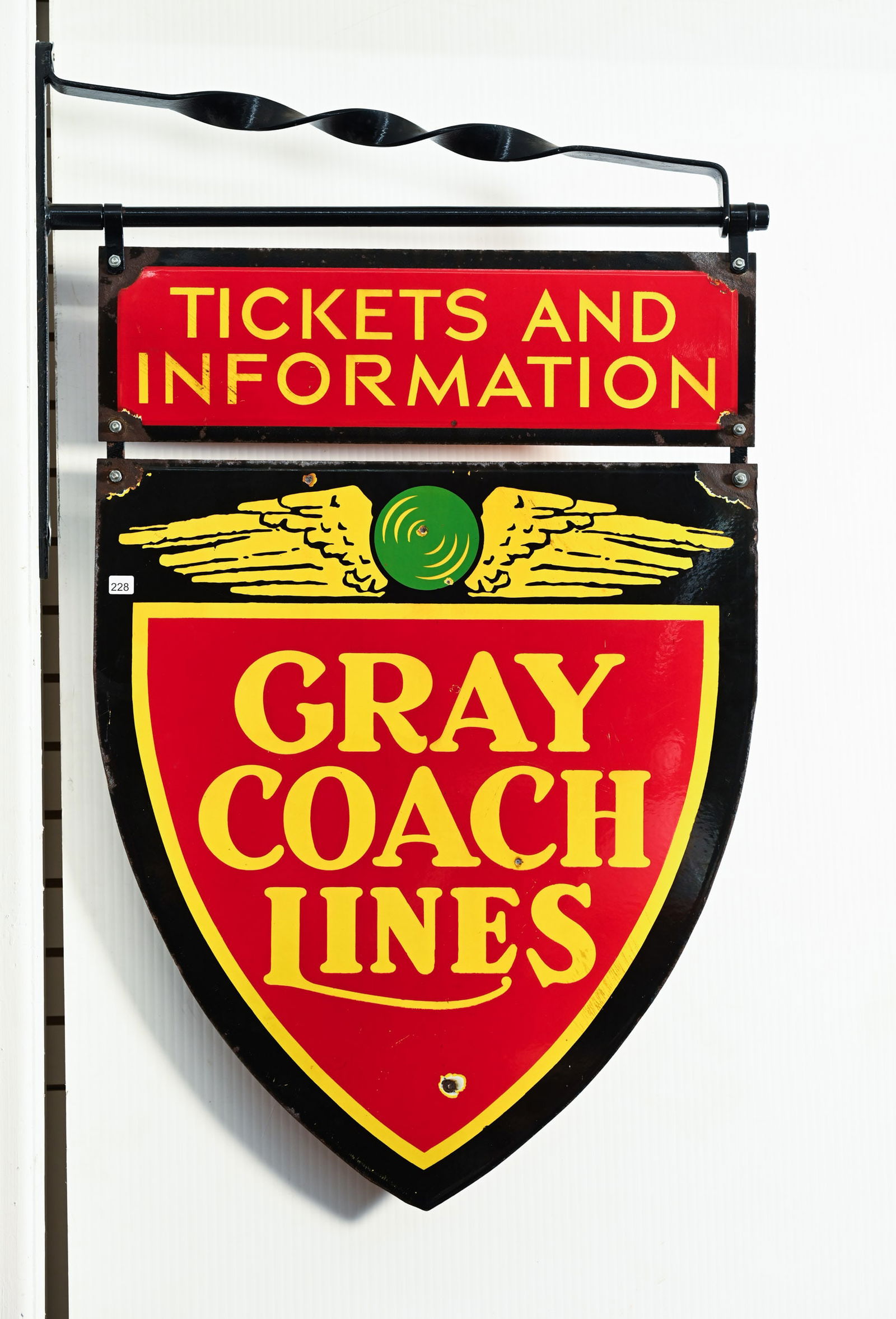 GRAY COACH LINES D/S PORCELAIN HANGER SIGN: GRAY COACH LINES TICKET AND INFORMATION DOUBLE SIDED PORCELAIN HANGER SIGN NOT MARKED STRONG COLOURS AND GLOSS ON BOTH SIDES FRONT SIDE SHOWS SMALL CHIPS OF PORCELAIN LOSS IN MID TO UPPER FIELD LARGER
