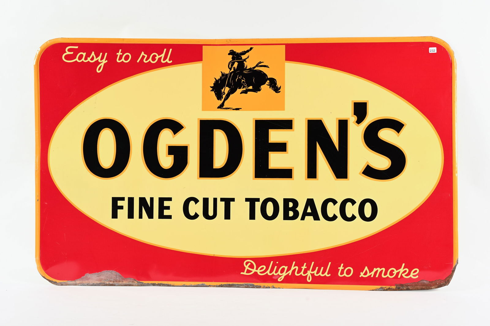 OGDEN'S FINE CUT TOBACCO TIN SIGN: OGDEN'S FINE CUT TOBACCO TIN SIGN EASY TO ROLL DELIGHTFUL TO SMOKE NOT MARKED SELF FRAMED EDGE STRONG COLOURS AND GLOSS FIELD IN VERY GOOD CONDITION SHOWS WEAR WITH PAINT LOSS AT BOTTOM EDGE 