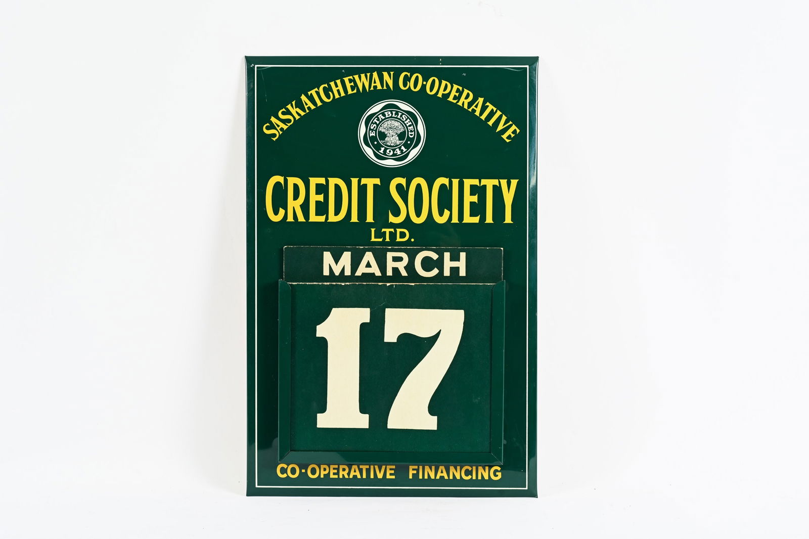 SASKATCHEWAN CO-OPERATIVE TIN CALENDAR: SASKATCHEWAN CO-OPERATIVE CREDIT SOCIETY TIN OVER CARDBOARD CALENDAR MARKED BLACKHALL & COMPANY LIMITED, TORONTO VERY GOOD CONDITION WITH STRONG COLOURS SHOWS SOME MINOR SURFACE SCRATCHES APPEARS