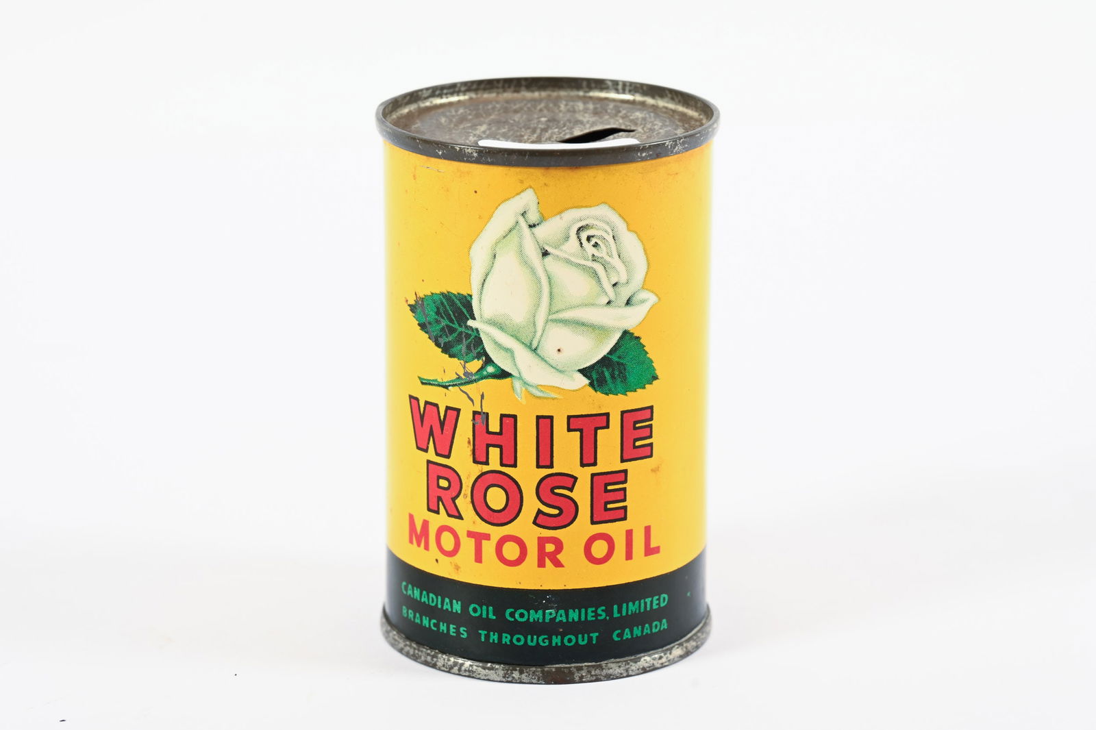WHITE ROSE MOTOR OIL SIX OUNCE CAN BANK: WHITE ROSE MOTOR OIL SIX OUNCE CAN BANK CANADIAN OIL COMPANIES LIMITED OVERALL GOOD CONDITION SHOWS SOME MINOR WEAR