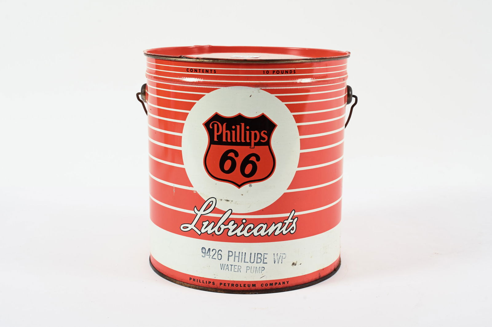 PHILLIPS 66 PHILUBE WATER PUMP GREASE 10 POUND CAN: PHILLIPS 66 PHILUBE WATER PUMP GREASE 10 POUND CAN PHILLIPS PETROLEUM COMPANY GOOD CONDITION WITH STRONG COLOURS SOME DENTING ON BACK SIDE FULL