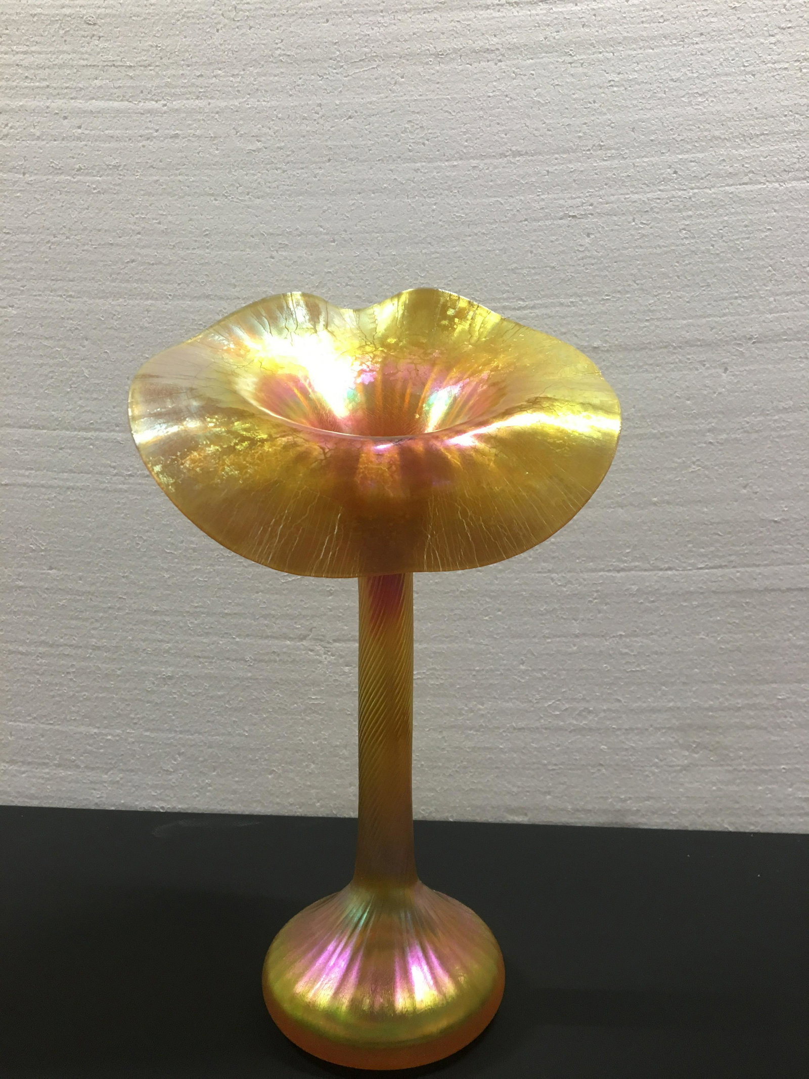 Lundberg Gold Lustre Jack in the Pulpit Vase: Signed Lundberg 1997. Made by Stephen Lunberg, master glass blower.This piece is spectacular, and in pristine condition. 10.5 high with a 6.5 wide petal. Perfect example of a Jack in the Pulpit.