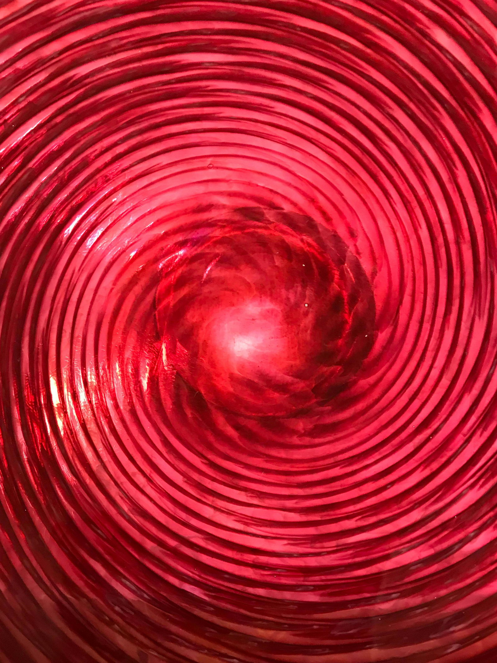 Extra large blown glass platter: In cranberry tones, with fuschias, pinks and whites, this platter measure a whoping 23.5 diameter, and 4 in height. A clear base with etched bottom. This piece was custom made for a glass for a projec