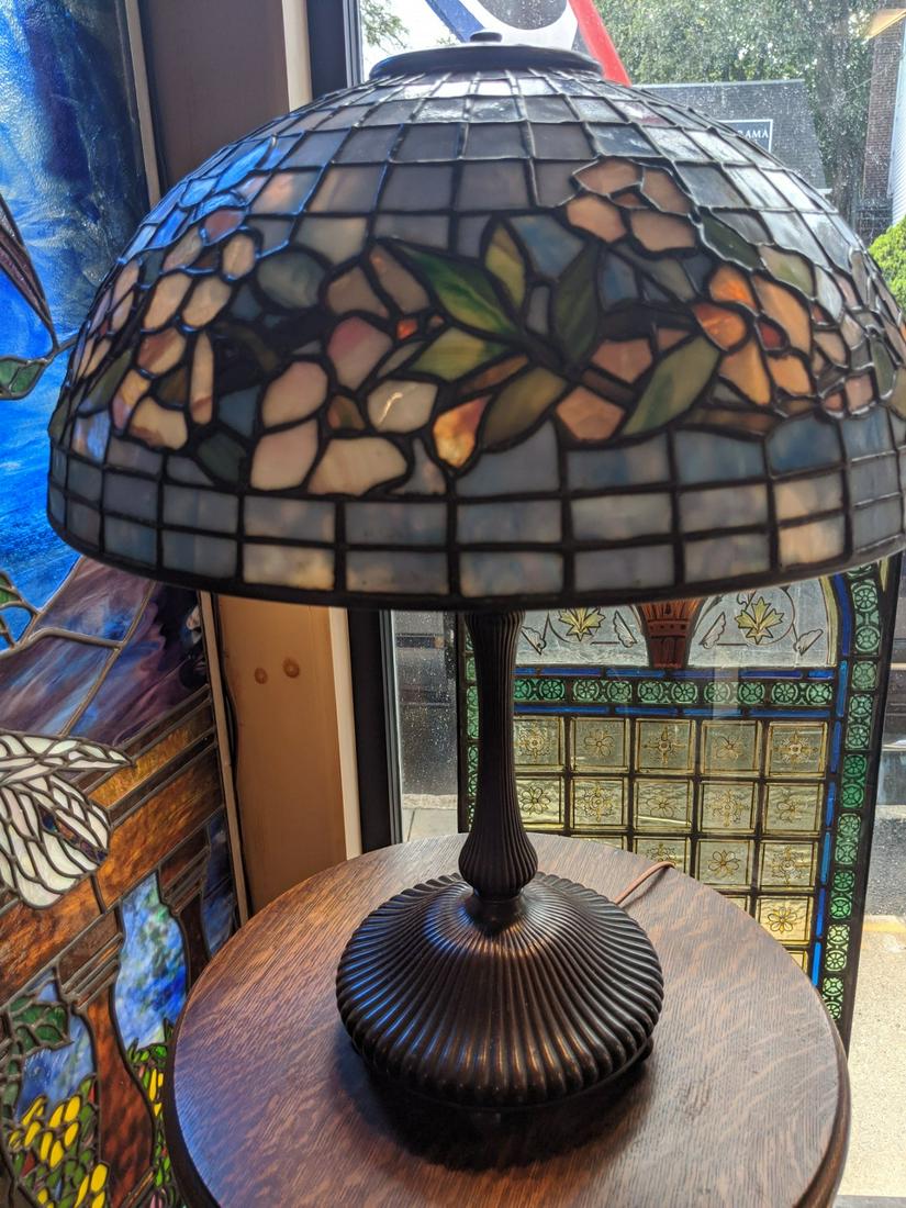 Vintage Tiffany Reproduction on original Tiffany Base: This 16" Dogwood shade is marked " Tiffany studios New York", It is at very least a very good forgery. n The base is stamped "Tiffany Stdios New York" with number 370. I believe the base to be authent