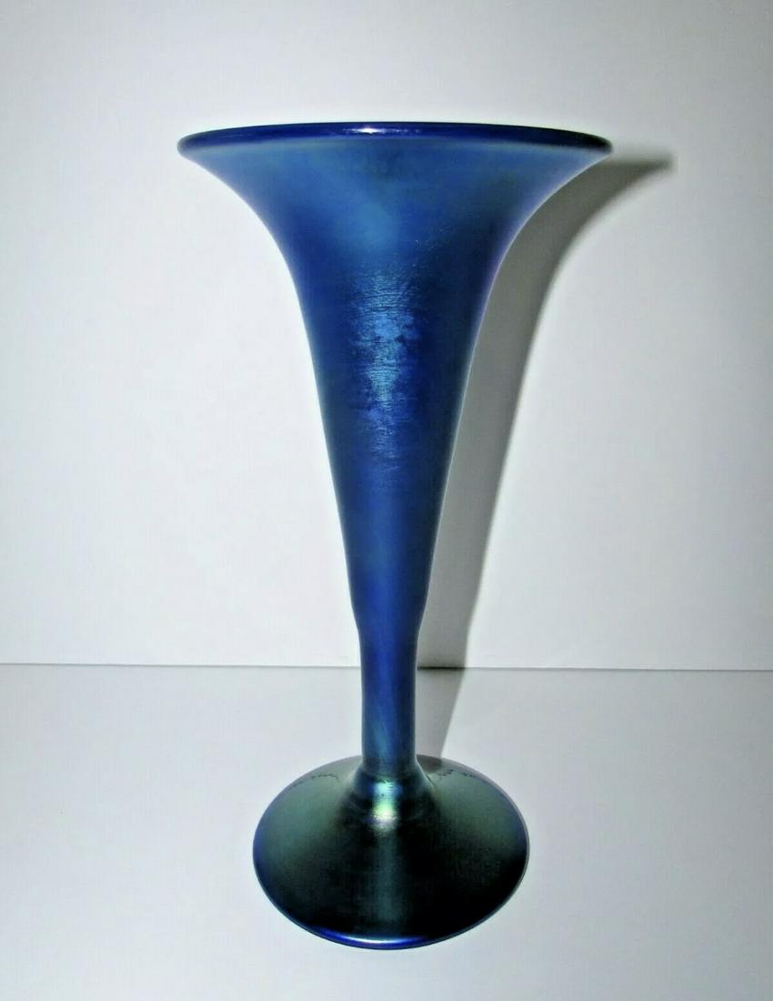Antique blue Aurene Trumpet Vase: This piece is in very good condition. In the process of making this piece, there was a small bubble formed, perhaps that is why the artist did not sign. My best guess is that this is a possible Stuebe
