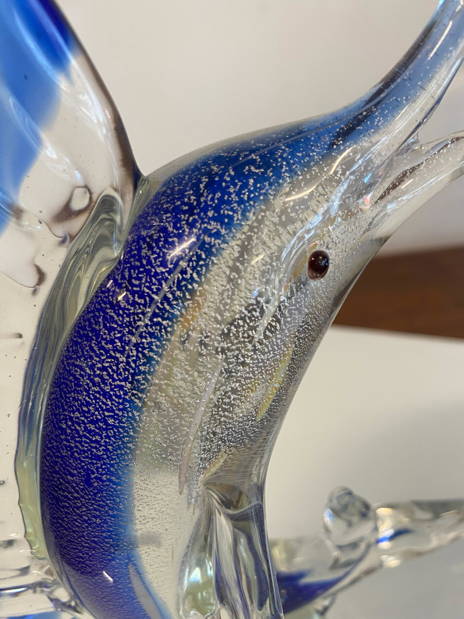 Blown glass Murano Marlin Sculpture: This Marlin measures 10" tall and 7" wide. Clear glass with cobalt blue and silver fleck. Weight of 2 1/2 lbs. A very nice display piece