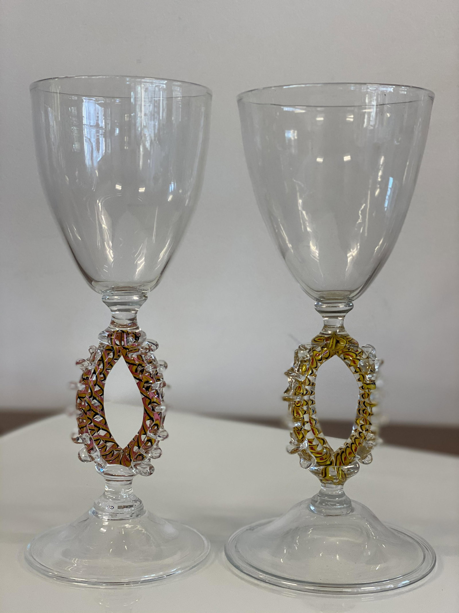French Artist Allain Guillot set wine glasses: Signed and dated, matching stems, with slightly different twisted bases.8 3/*" tall, x 3 1/2" diameter. excellent condition.