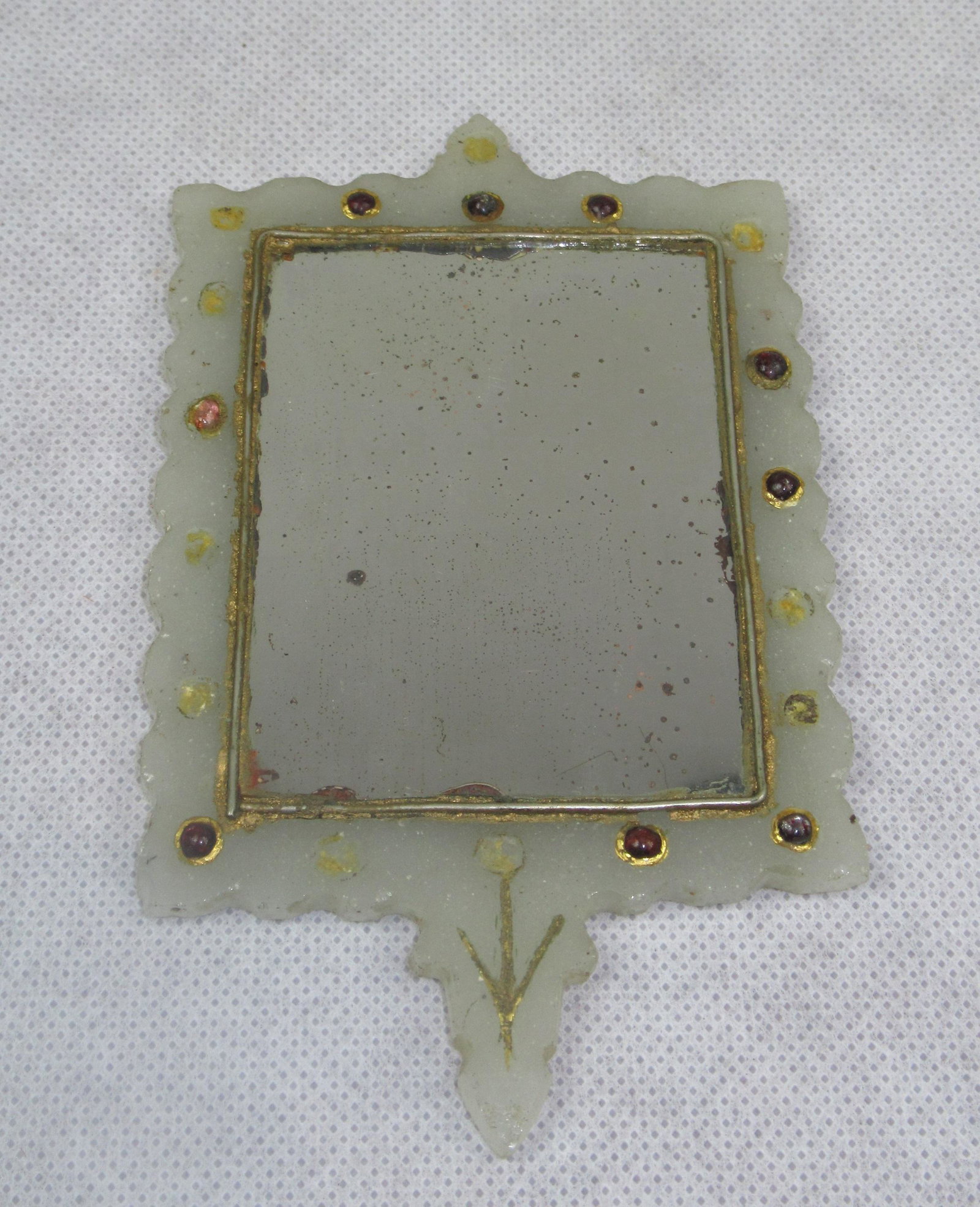 Mughal' style jade mirror: Jade mounted mirror in Mughal style, 14cm x 9cm