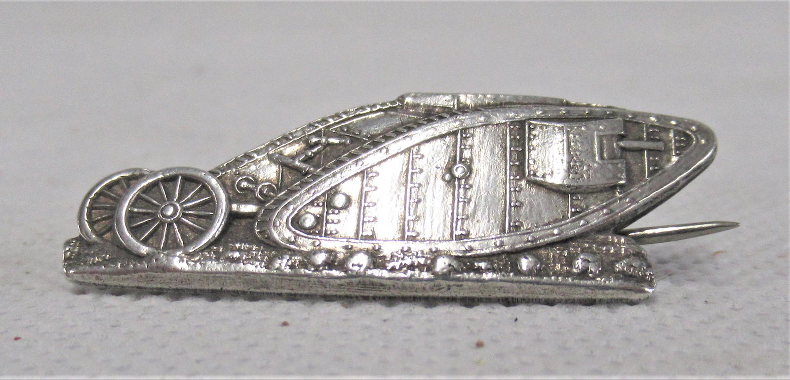 A Silver Badge of A British Mark I Tank: Birmingham 1916, HC Freeman Ltd., approximately 4cm