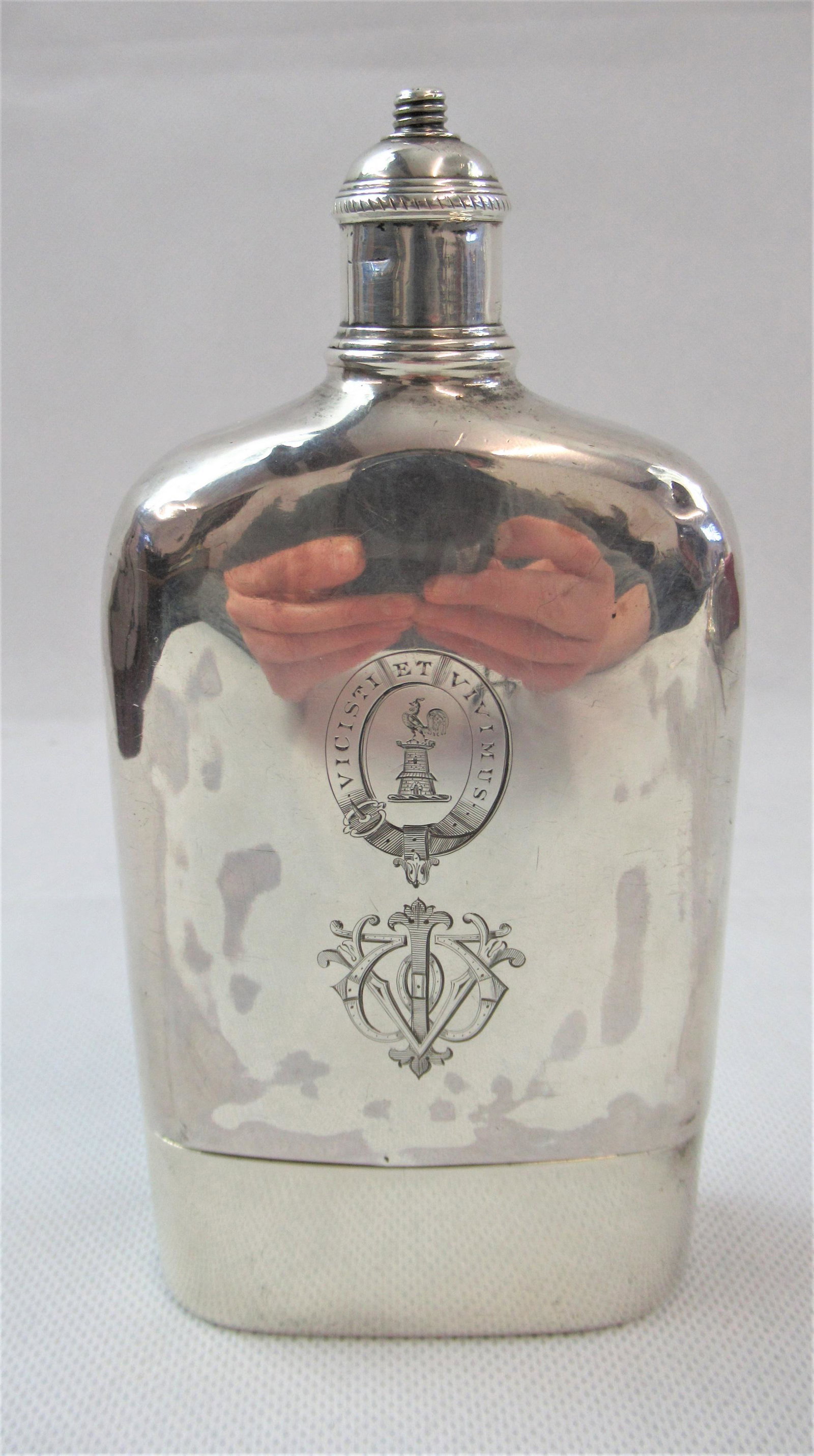 A Fine & Rare Georgian Silver Hip Flask by Hester: Hallmarked London 1778. Converts to a candlestick with gilding to cup inner. Approximately 16cm. Total weight 276g.