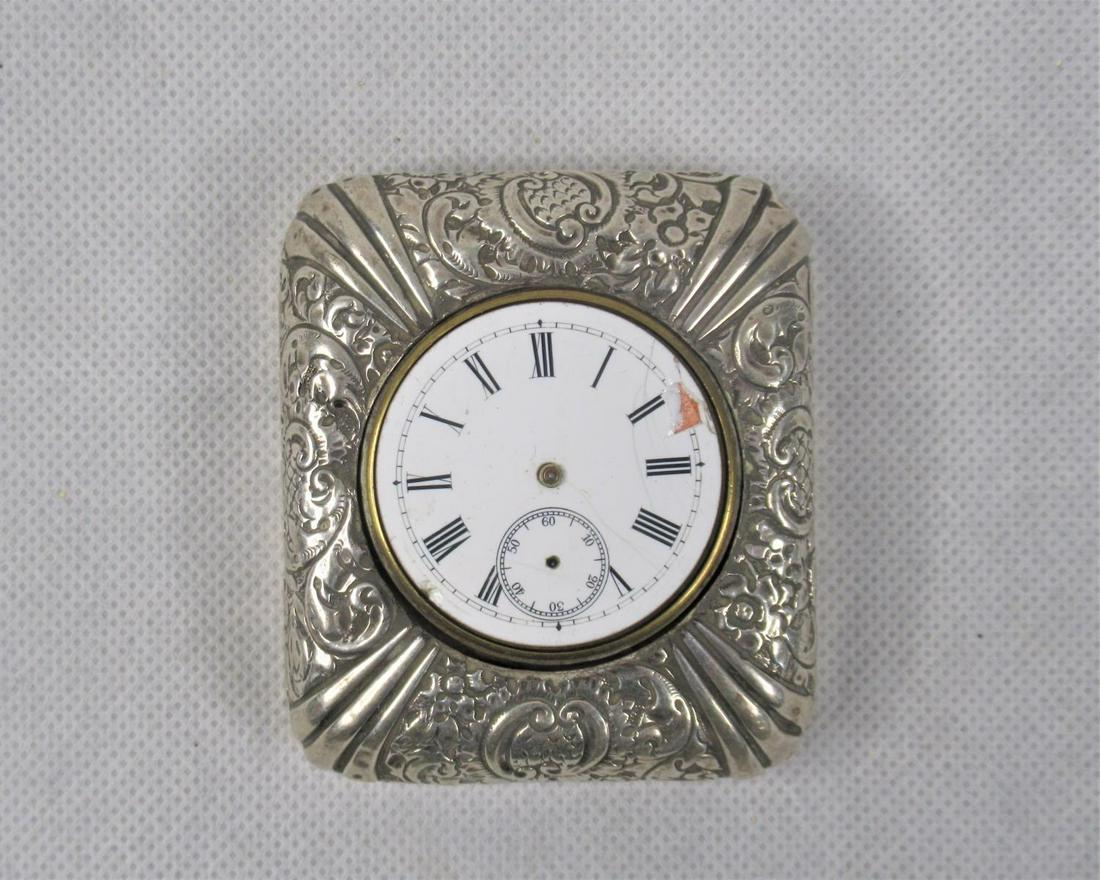 An Edwardian Silver Watch Case: with movement, Birmingham 1916.
