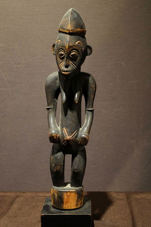 Senufo top of a cultivator staff