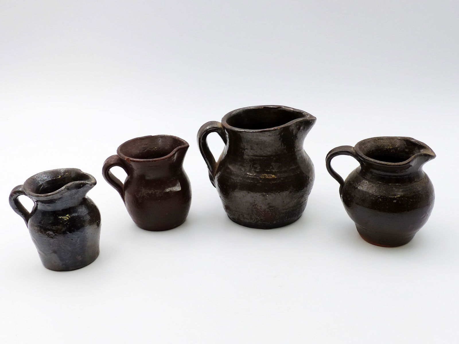 Group Of Small Pottery Pitchers (1 of 6)