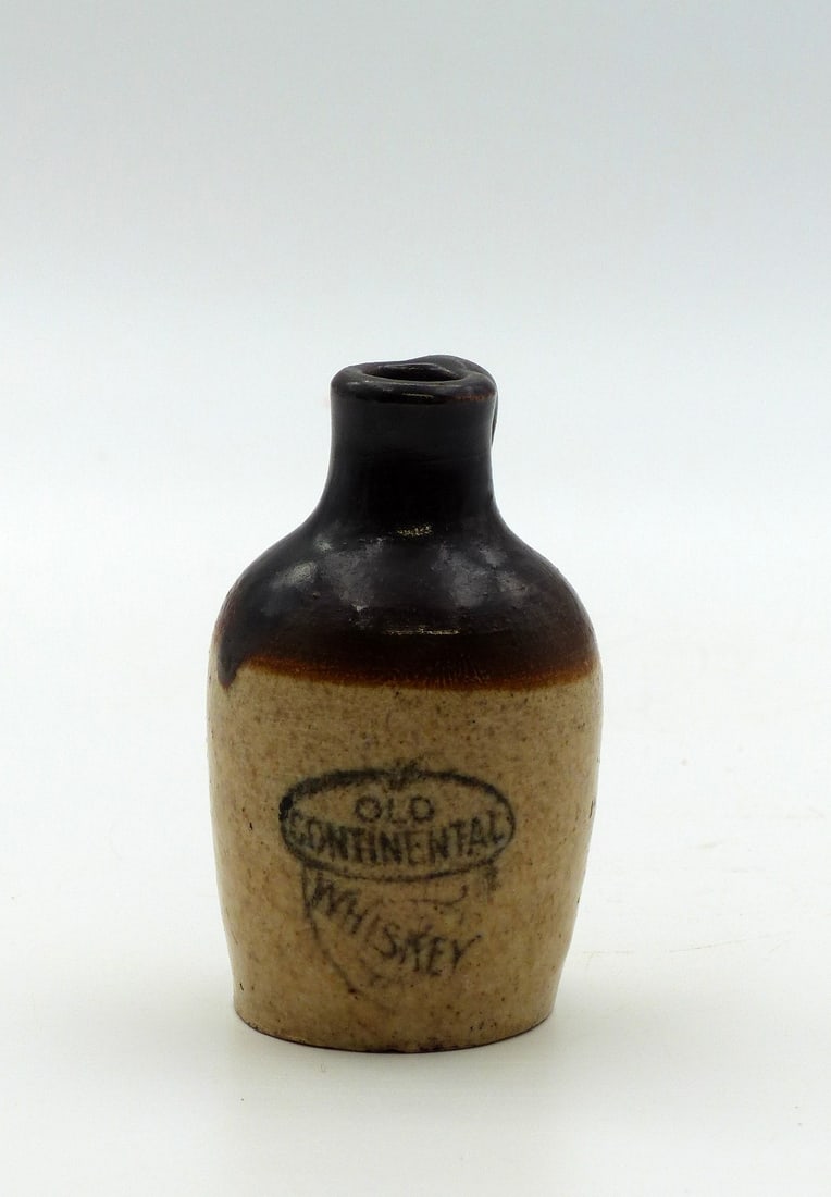 Small Continental Whiskey Sample Jug: Small continental whiskey sample jug -Condition: mint ; 3 3/8 " H