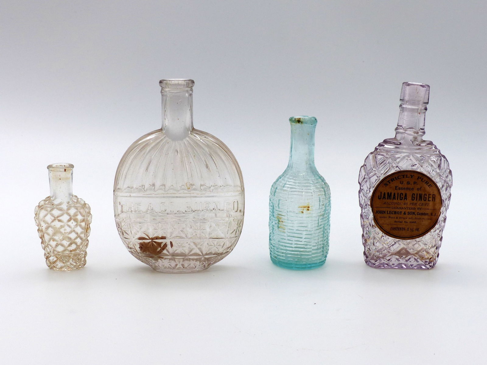 Group Of 4 Pressed Glass Bottles (1 of 6)
