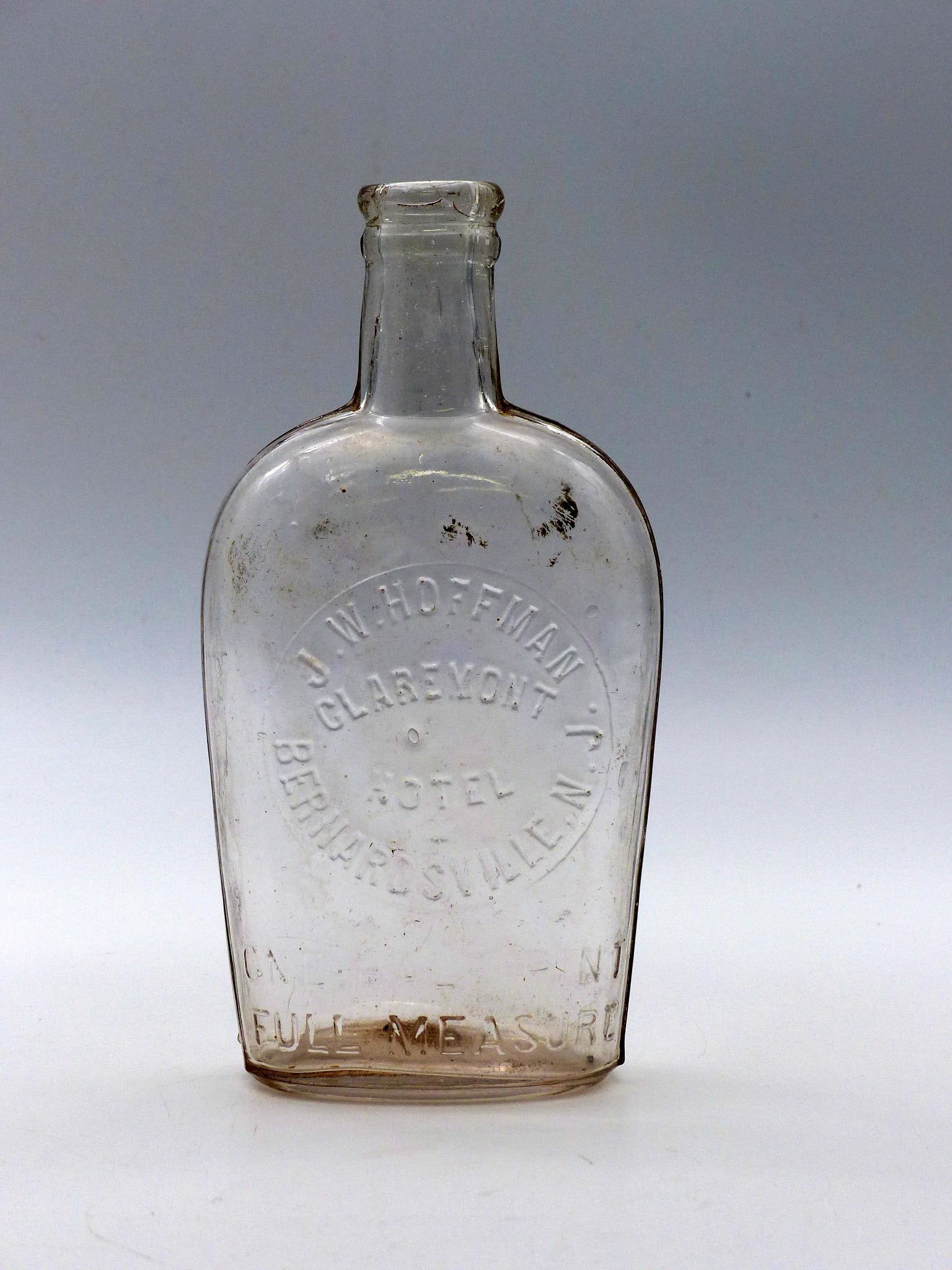 J.W. Hoffman Bernardsville New Jersey Bottle Claremont Hotel Bottle Flask: J.W. HOFFMAN BERNARDSVILLE NEW JERSEY BOTTLE CLAREMONT HOTEL BOTTLE FLASK -Condition: Excellent ;