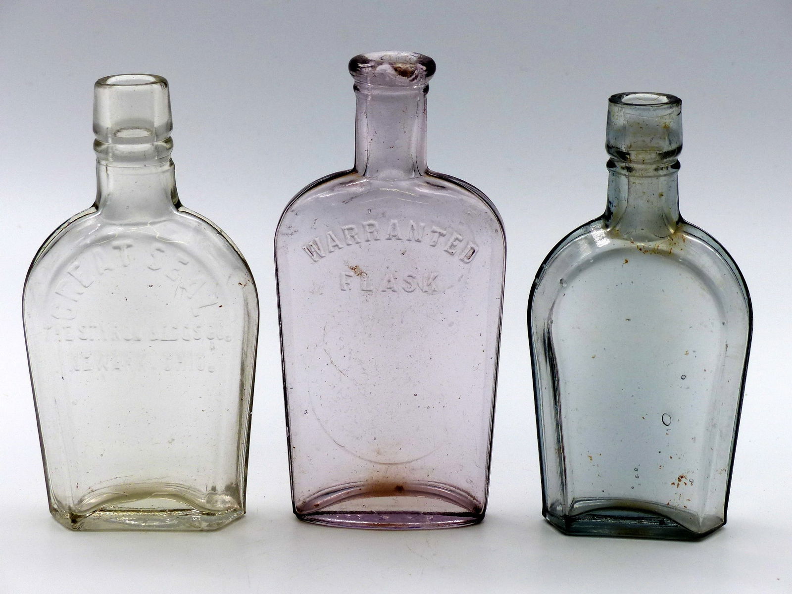 3 Small Flasks; "great Seal", "warranted", Blank: 3 Small Flasks; "Great Seal", "Warranted", Blank -Clear ; Condition: Good ; 5", 5.25", 4.875"H