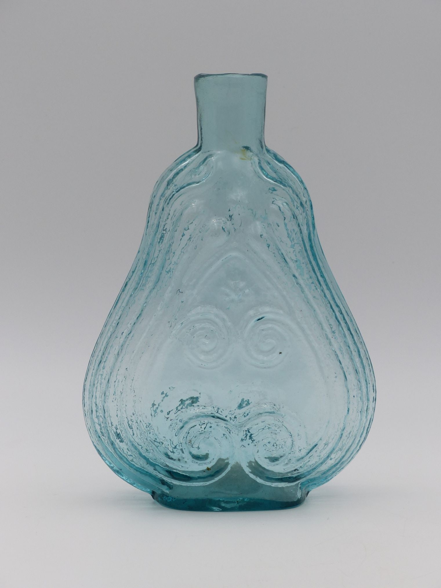 "Scroll Onion Bottle: Refined Scroll Onion Bottle - This stunning Scroll Onion Bottle displays a graceful silhouette with distinctively swirling patterns that reflect the artistry of early glassblowing techniques. Made fro