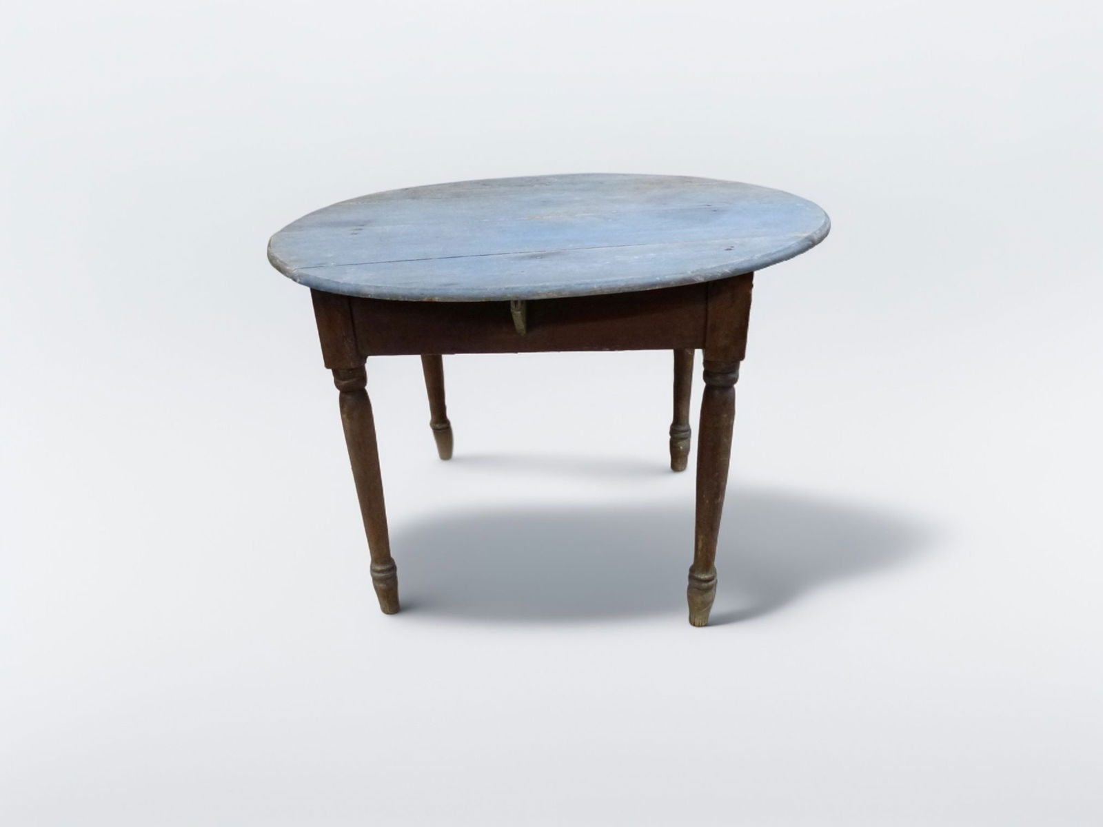 Pegged Turn Leg Table with Round Top: This charming pegged turn leg table features a gracefully contoured round top, complemented by traditional turned legs, exemplifying classic craftsmanship. Its well-worn blue finish adds character, su
