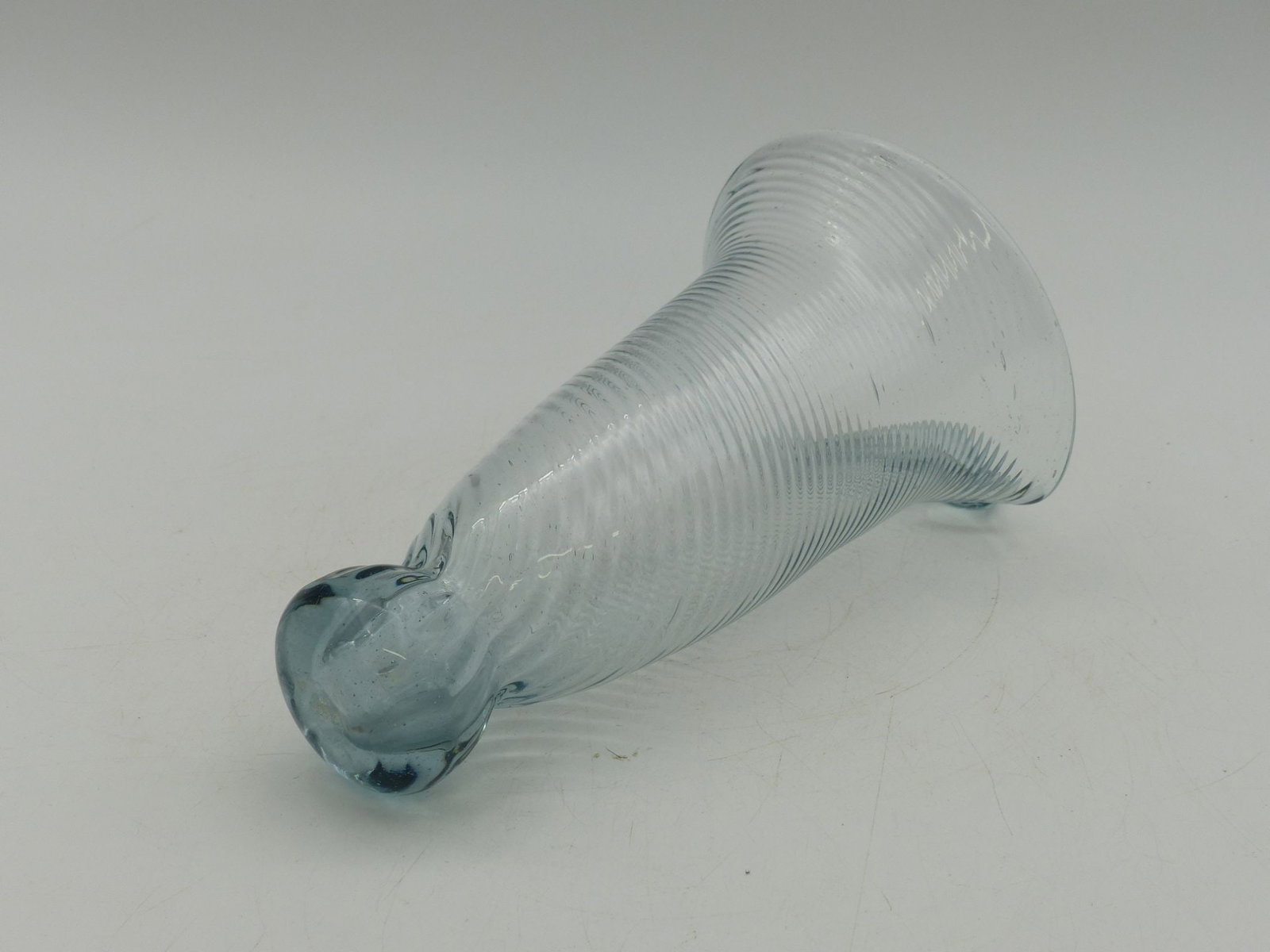 Glass Hanging Wall Pocket (Mint): This exquisite glass hanging wall pocket features a delicate ribbed design that enhances its aesthetic appeal. Crafted from clear glass, its elegant silhouette and translucent hues catch the eye, whil