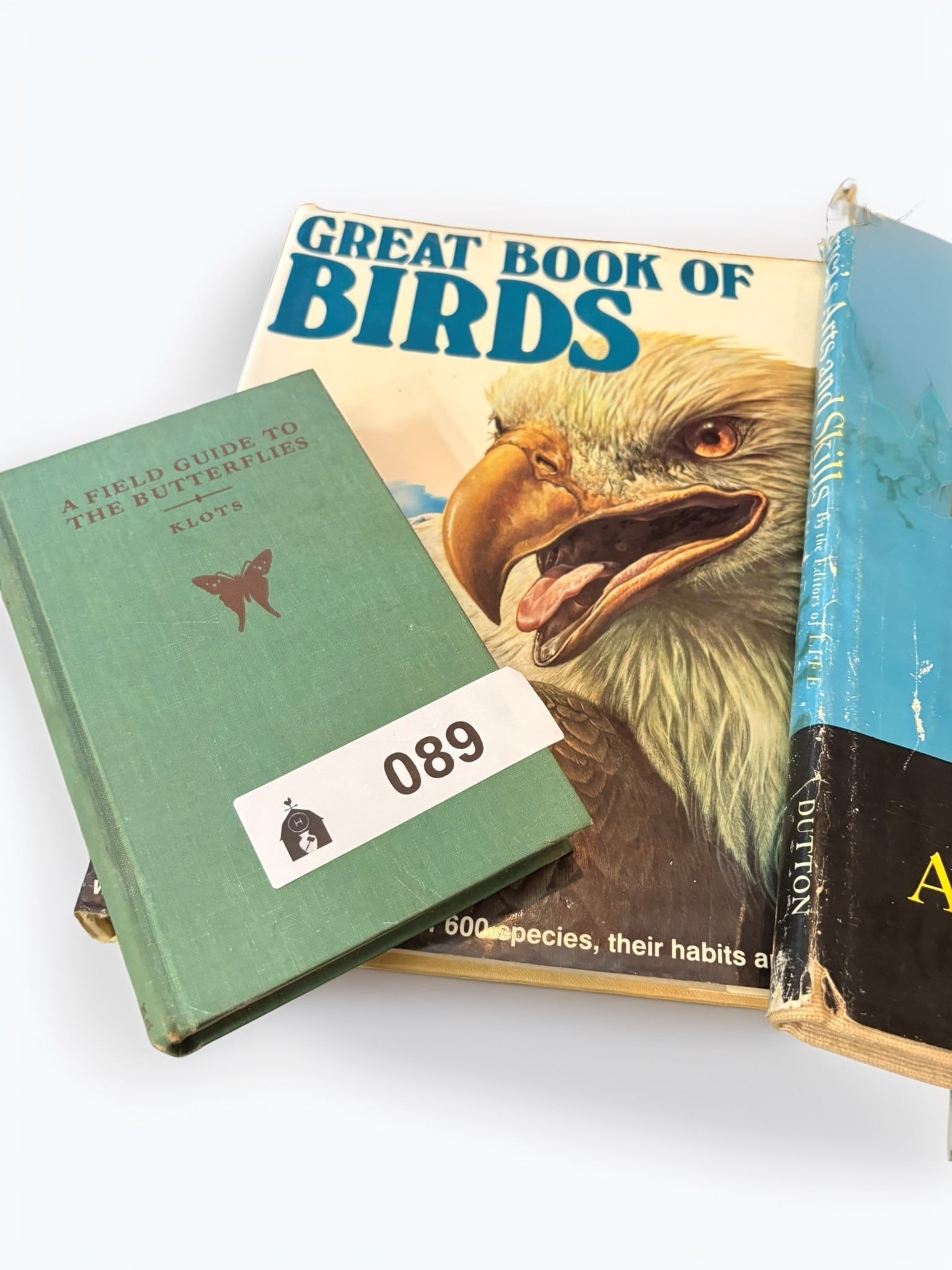 Collection of Three Natural History and Americana Books: This lot features a curated collection of three vintage reference books focused on natural history and American craftsmanship. The set includes 'America's Arts and Skills' by the Editors of Life, 'The