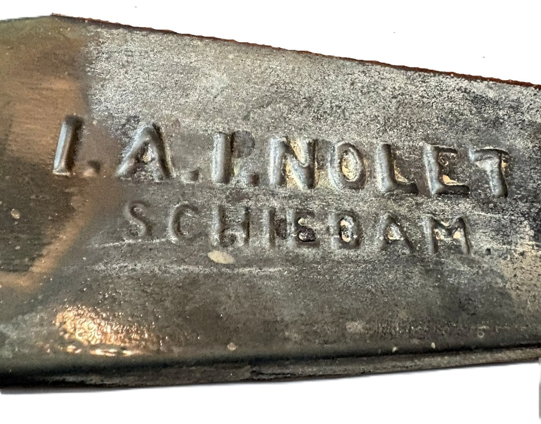 Collection of Antique L.A. Nolet Schiedam Gin Bottles: This collection features a set of three antique stoneware gin bottles, famously associated with the L.A. Nolet distillery in Schiedam, Netherlands. Each bottle exhibits the iconic dark glazed finish c