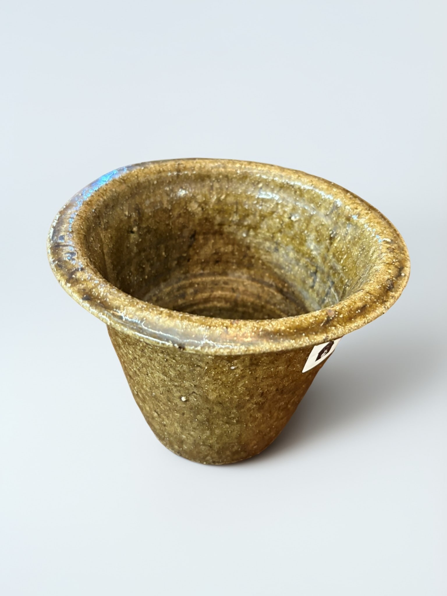 American Southern Folk Pottery Alkaline Glazed Small Vessel: A classic example of American Southern folk pottery, likely originating from the Georgia or Carolina regions. This small, hand-thrown vessel features a traditional olive-brown alkaline glaze,