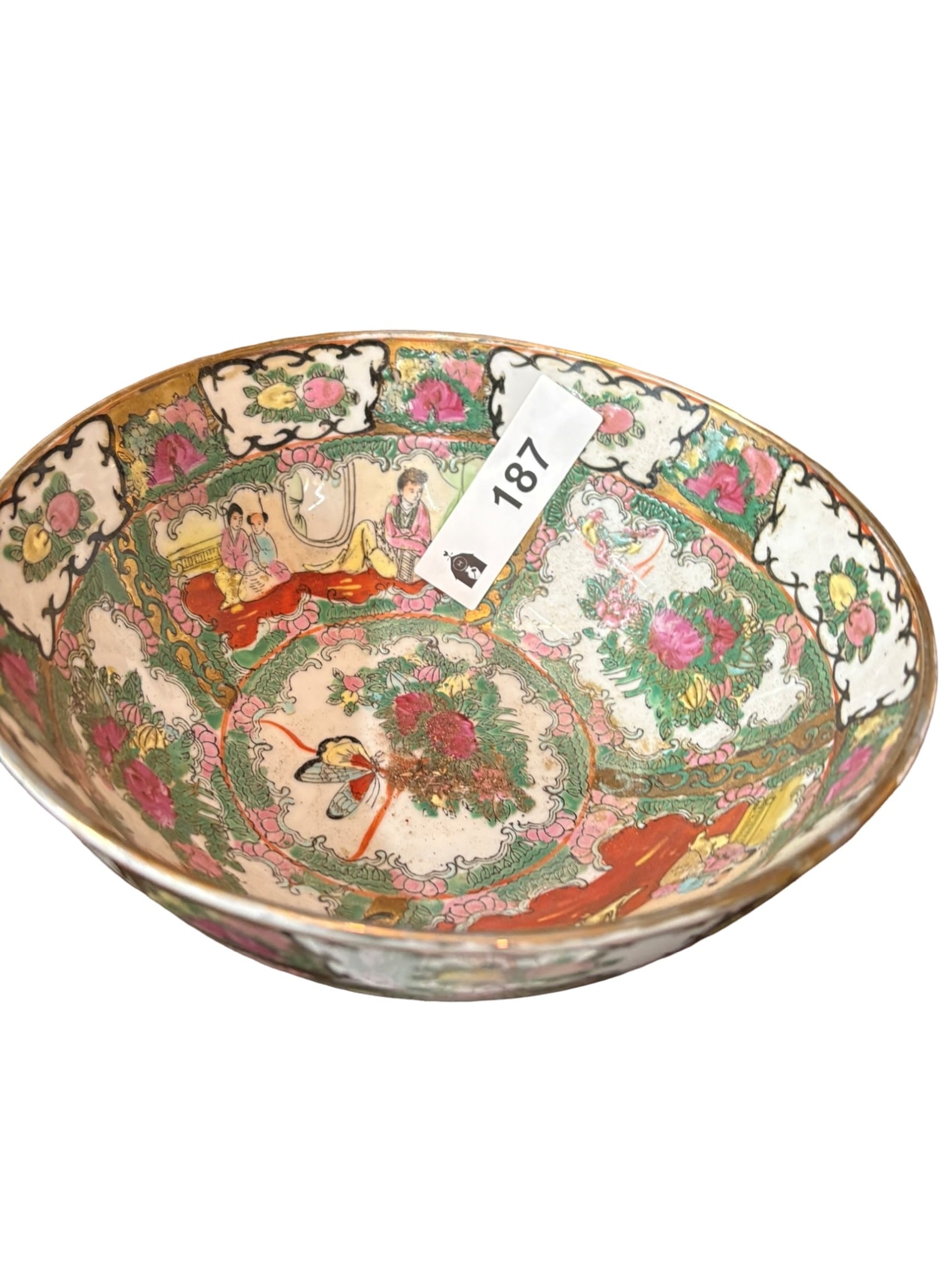 Chinese Rose Medallion Porcelain Bowl and Saucer Set: This set features a bowl and matching saucer decorated in the traditional Chinese Rose Medallion pattern. The intricate enamel work showcases alternating panels of figures in garden settings and flora