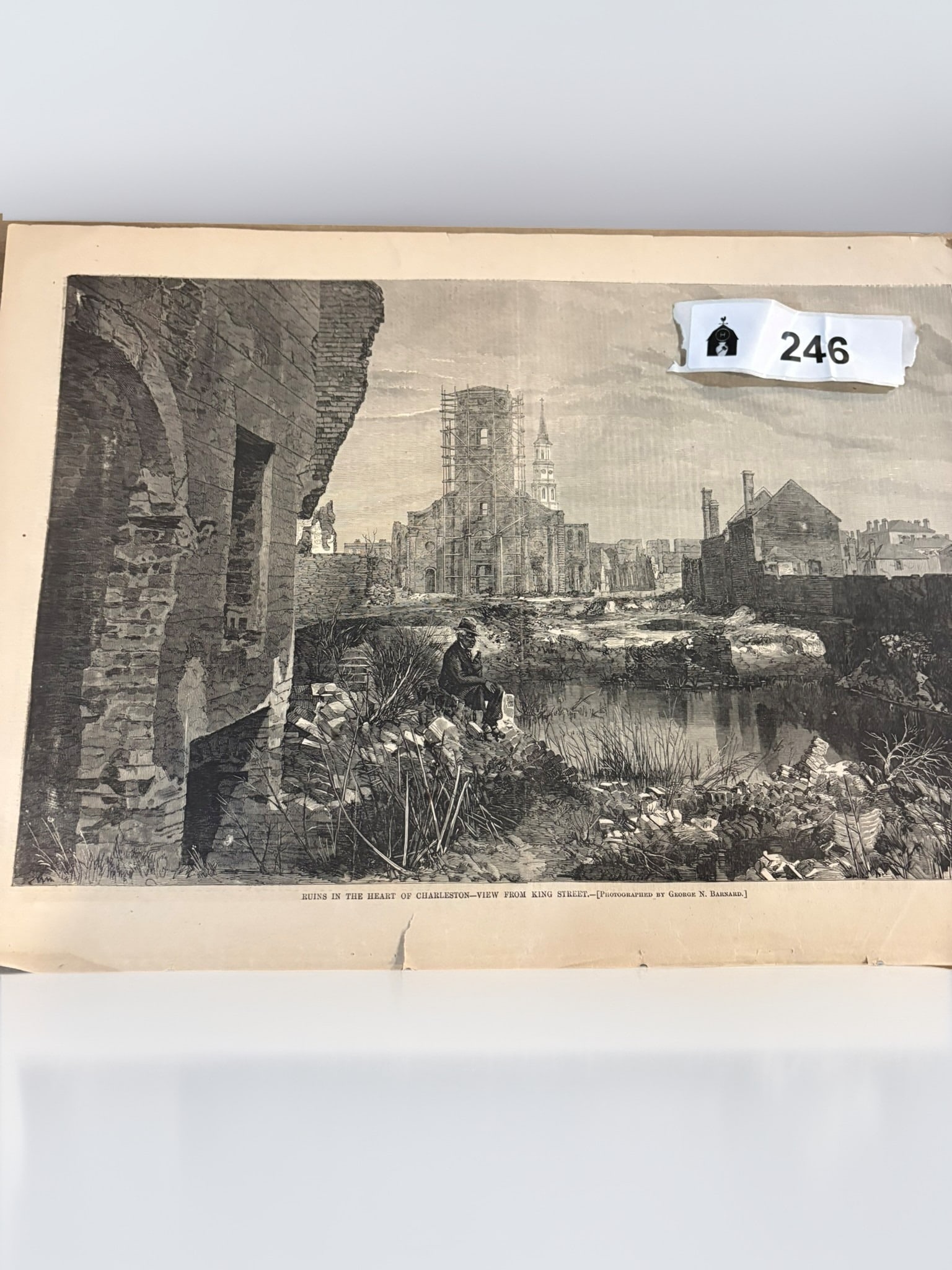 Historical Engraving of Ruins in Charleston: This nineteenth-century wood engraving depicts the post-Civil War ruins in Charleston, South Carolina, specifically a view from King Street. The print is based on a photograph by George N. Barnard and
