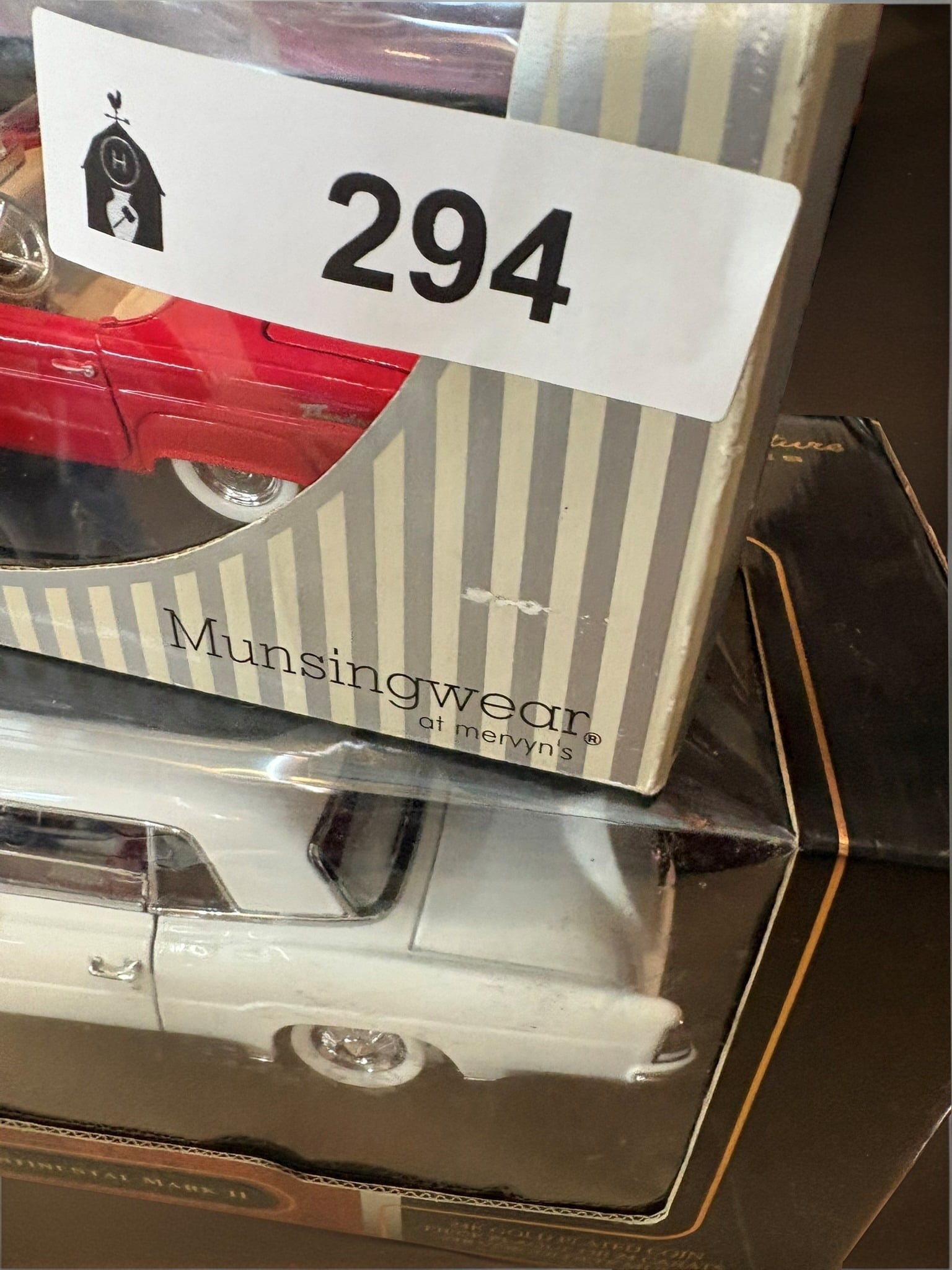 Road Signature 1956 Continental Mark II Die-Cast Model: A detailed 1:18 scale die-cast replica of a 1956 Continental Mark II by Road Signature. This highly collectible automotive model features meticulous interior and exterior detailing, capturing the eleg